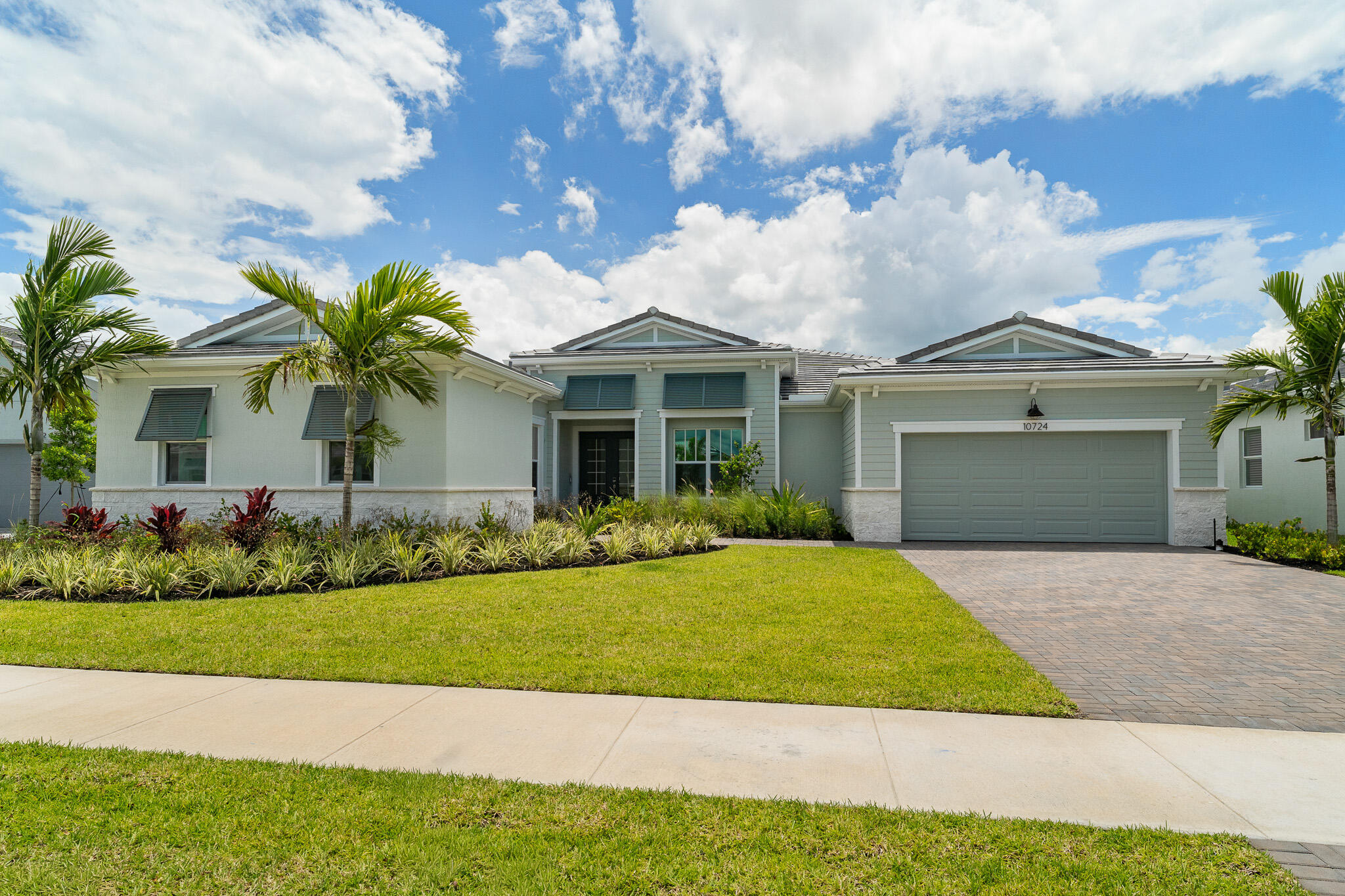 The 3,236 square foot Monaco floorplan features 4 bedrooms, 3.5 Bath, and 3-car garage. The covered front porch leads to a foyer with flex room on one side and a Den on the other -- with a large, open and inviting Great Room, dining and kitchen area beyond. The owner's suite features a large walk-in closet, a walk-in shower with a glass enclosure, and a separate linen closet. The three additional bedrooms all share a full bath with double sinks. The large covered lanai with slicing door access off the dining room offers additional space for relaxation and entertaining.