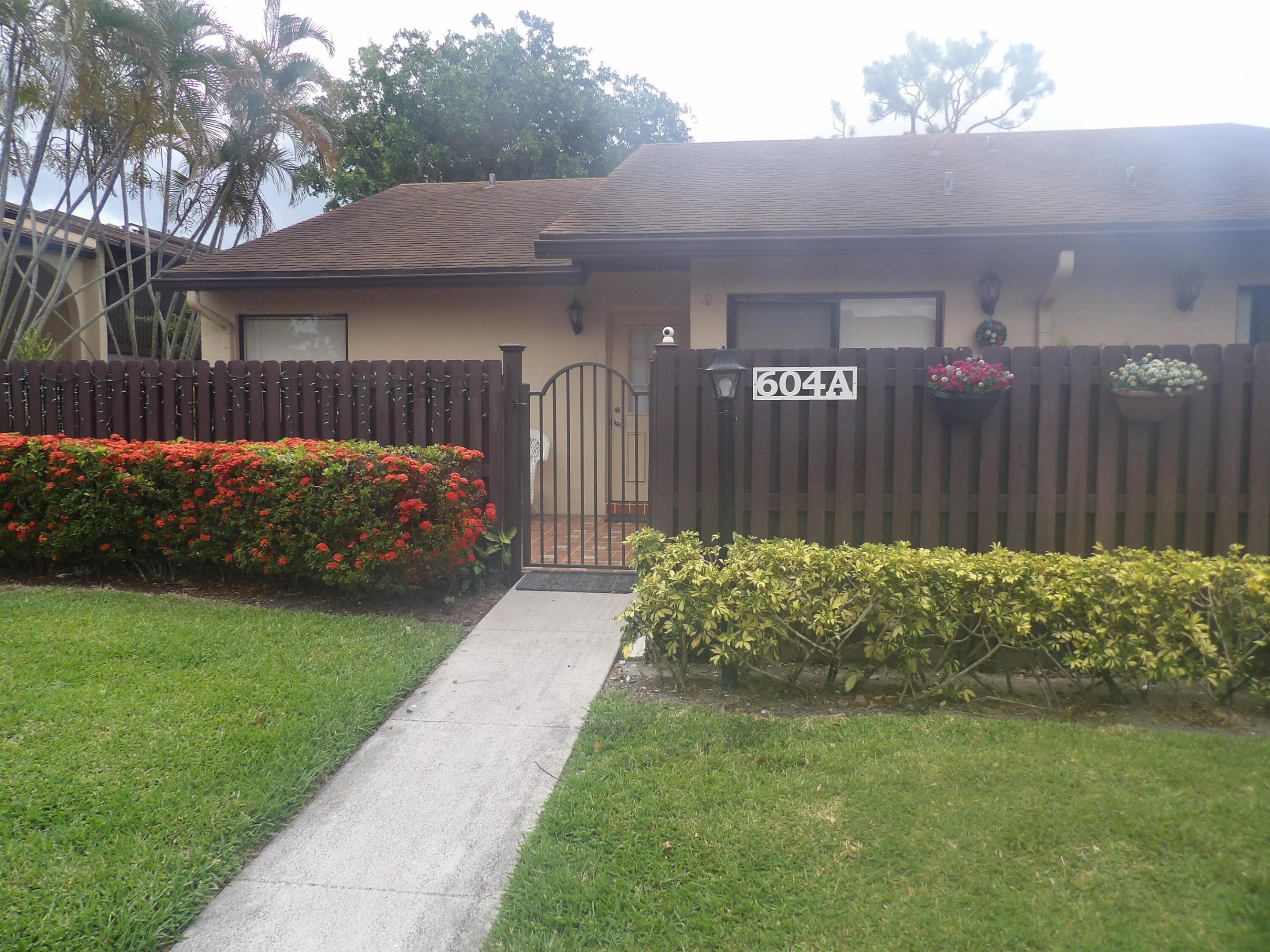 Nice Villa 2 bedroom, 2 bathroom with huge enclosed patio, corner unit, lake view, open front and back patio, nice kitchen with wood cabinets and granite counter, tile in the kitchen, laminated in living and dining are and the guest bedroom, carpet in the master bedroom, excellent community and amenities