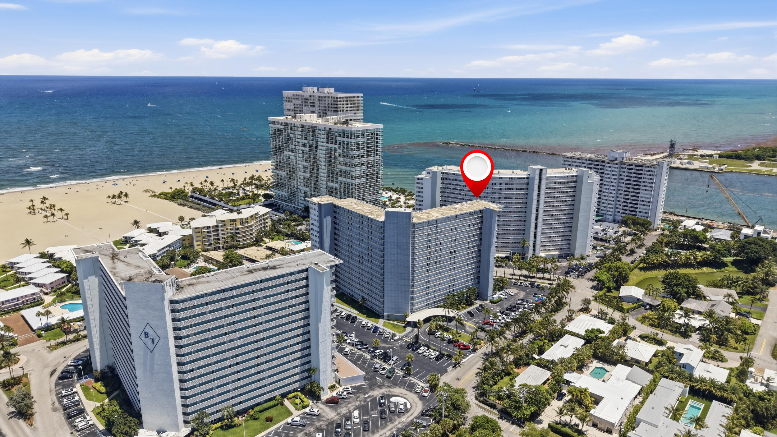 Priced to renovate. This 3-bedroom, 2-bath co-op at Atlantic Towers offers 1,293 sq ft of potential on the 5th floor of a well-maintained 16-story beachside building. The kitchen is fully gutted and ready for your custom build-out; bathrooms are original and waiting for your finish. Impact glass windows and balcony doors are already in place. South and west-facing balcony with Intracoastal and city views. Building amenities include a heated pool, fitness center, beach access, and a clubroom available for private events. Comparable remodeled units in the same building are listed above $500K. Due to the condition of the unit, cash offers only. Buyer approval required. Bring your contractor and your vision.