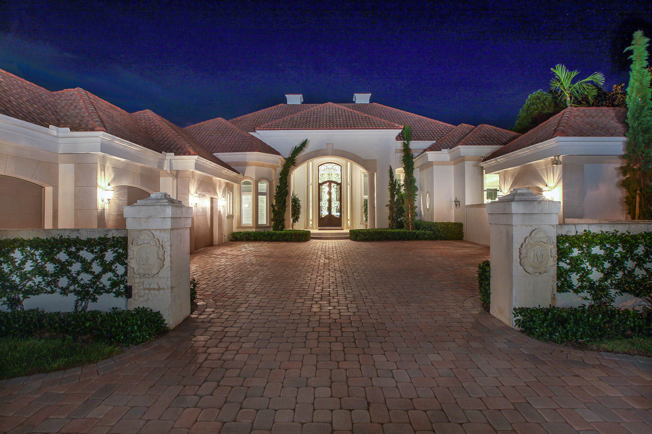 Live in pure bliss in this Custom Waterfront  Estate Home in Admirals Cove.  This home boasts 6 bedrooms and baths, renovated kitchen with granite and custom cabinets, 2 - 2 story guest houses with fabulous waterway views, resort style pool and patio for hours of outdoor fun, lavish master suite with walk-ins closets, marble bath and French doors to patio, 3 car plus golf cart garage, protected dock for large yacht and much more.  This home is for everyone, and is minutes from the Intracoastal a must see.