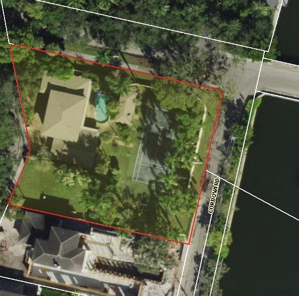 Rarely available builders dream come true: 6 lots in Rio Vista under one parcel but can be sub-divided. Currently, there is a 4100 sq ft 4/4 pool home with a new roof (2019), a lighted tennis court, pool house, and room to roam. This 32,233 sq ft property is situated between Ponce De Leon on the west and Cordova Road on the east with 150 feet of permitted waterfront access for exclusive use by the permit holder (buyer), with quick ocean access and no fixed bridges.  City is installing a new sea wall along Cordova. Buyer can build a floating/fixed dock to house their own boats. Great opportunity for a builder or a home owner looking for space and waterfront property. This one of a kind property won’t last so call to make your appt.