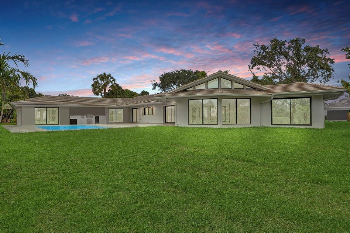 Gorgeous home sits right at the epicenter of East Fort Lauderdale's most prestigious  Country Club. With unobstructed beautiful golf course views & open floor plan this fully remodeled mid-century architect's estate could be the home of your dreams. Over 1/2 acre of lot space, 4 bedrooms, 4 & half bathrooms, huge master suite with a large dressing area and a gorgeous Master bath, guest suite overlooking pool & golf course, All New Plumbing, New Electrical, Italian chef kitchen, laundry room, outdoor bar seating, summer kitchen, and so much more! Your dream is ready to become a reality at 2500 NE 40th street This home will go quickly.