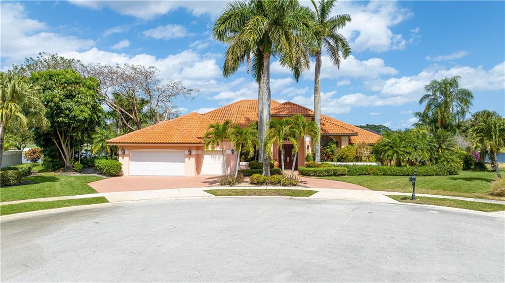 Sensational open floor plan with one of the most exquisite lakefront positionings in Stonebridge Country Club. The property impresses with tranquil, stunning, panoramic lake views from your living area, kitchen, pool-jacuzzi deck and primary suite. An inviting outdoor area perfect for entertaining as the outside-inside living areas create a very large, open space with tremendous screened enclosure. Beautiful natural light, high-volume ceilings, hardwood floors in common areas, large chefs kitchen with hooded exhaust, gas island stove, double wall oven, one convection, second island sink with refrigerated doors and icemaker, granite countertops. Formal dining, formal foyer, split floor plan with second primary suite, walk-in closets, circular drive. Mandatory membership community. Sensational open floor plan with one of the most exquisite lakefront positionings in Stonebridge Country Club. The property impresses with tranquil, stunning, panoramic lake views from your living area, kitchen, pool/jacuzzi deck and primary suite. An inviting outdoor area perfect for entertaining as the outside/inside living areas create a very large, open space with tremendous screened enclosure. Beautiful natural light, high-volume ceilings, hardwood floors in common areas, large chefs kitchen with hooded exhaust, gas island stove, double wall oven, 1 convection, second island sink with refrigerated doors and icemaker, granite countertops. Formal dining, formal foyer, split floor plan with second primary suite, walk-in closets, circular drive. Mandatory membership community. Enjoy your private golf course, club room, state-of-the-art gym, 6 tennis courts, pickleball courts, restaurant and more. A great place to raise a family as well as retire surrounded by new friends.