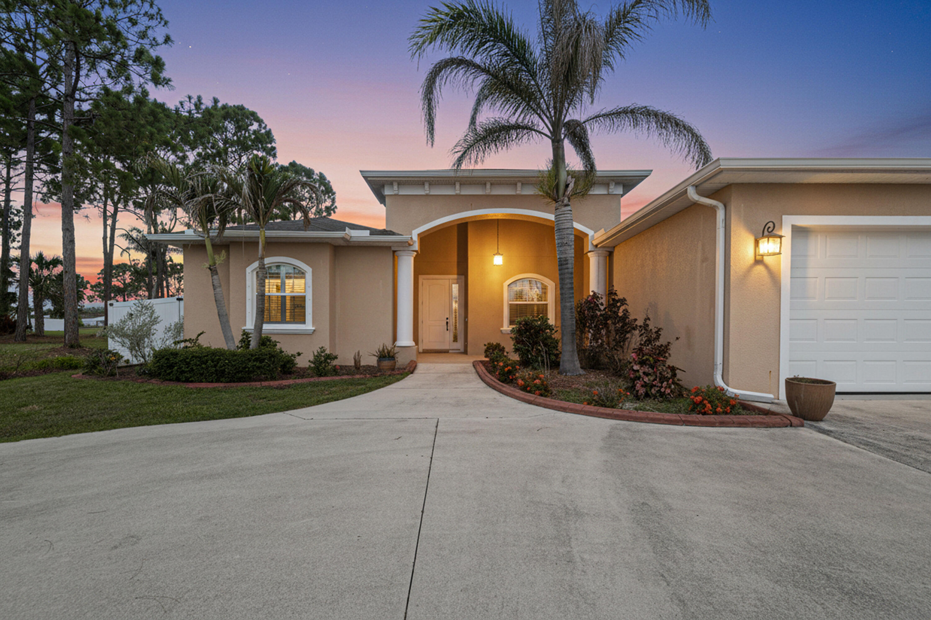 Welcome to this Beautiful 4 Bedroom, 3 Bath POOL Home in the Torino area of Port St Lucie, with no HOA! Offering 10 ft Coffered and Tray ceilings, Granite Counter Tops, Ceramic Wood look Tile floors, and Plantation Shutters throughout. Kitchen has Stainless Steel Appliances, Pantry, Tile Backsplash, Wet Bar, and abundant counter space.  Walk outside to the covered patio, leading to the private serene Swimming Pool with a Hot Tub, Waterfall, and shallow sunbathing area, surrounded by a spacious patio of brick pavers. Close to St Lucie West shopping , schools , parks, and restaurants.