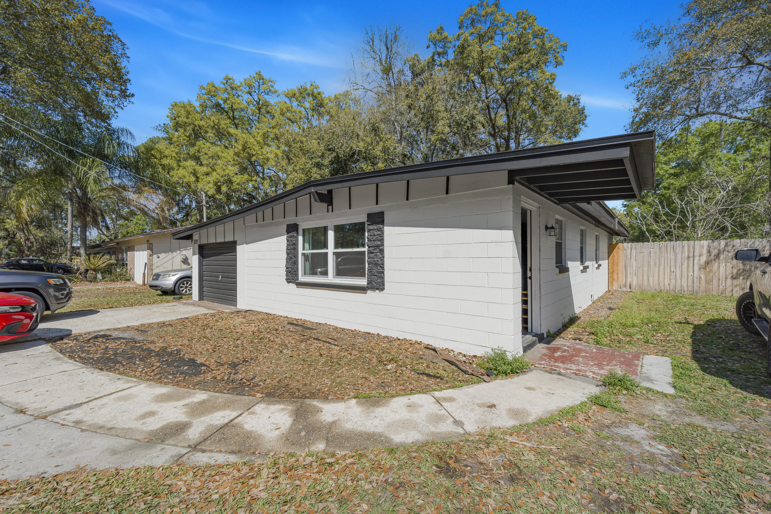 Fully renovated concrete block home in the desirable Mandarin area on a spacious quarter acre lot. This 2 bedroom, 2 bathroom home offers 1,152 square feet of updated living space with new roof, new AC, and new water heater. Interior features updated kitchen and bathrooms, new flooring, and modern fixtures throughout. Functional layout includes a comfortable living area with fireplace and a separate office or flex space ideal for working from home. Large yard offers room for outdoor living, parking, or future possibilities. No HOA. Conveniently located near shopping, dining, and major roadways. Move in ready and ideal for both owner occupants and investors seeking a low maintenance property