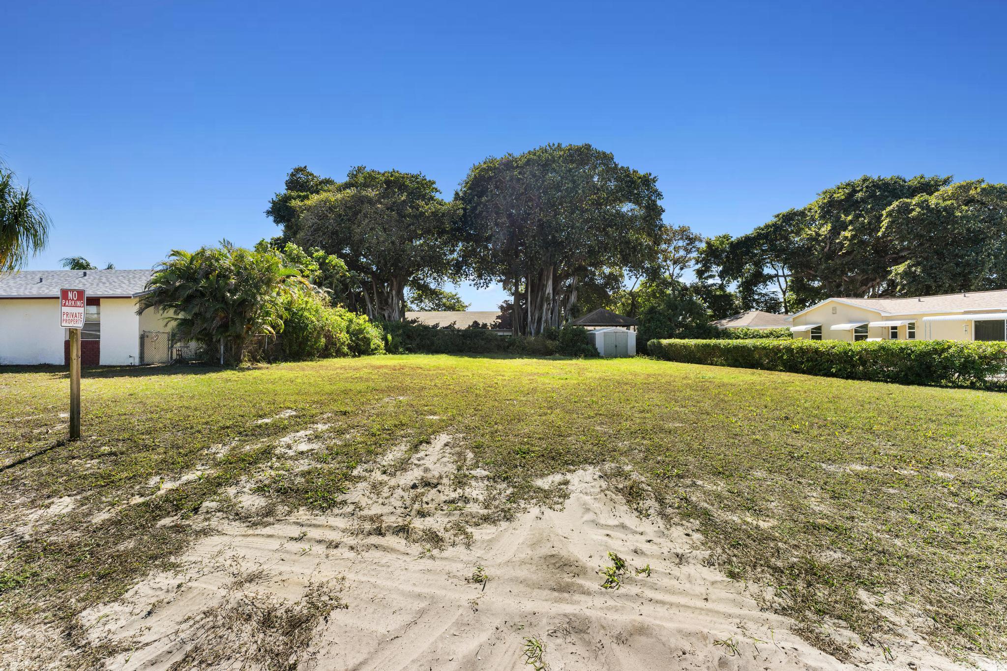 This 0.20-acre vacant lot offers excellent potential for development or future use and is ideally positioned directly behind a home that is also currently for sale—presenting a rare chance to acquire additional land and maximize value. Whether you're looking to build, hold as an investment, or create a larger estate by combining both parcels, the possibilities are wide open. Located off High Ridge Road in the desirable Lake Osborne area, close to major roadways, shopping, and dining. No HOA restrictions provide flexibility for development, expansion, or long-term investment. Purchase individually or as a package with the adjacent home for enhanced upside.