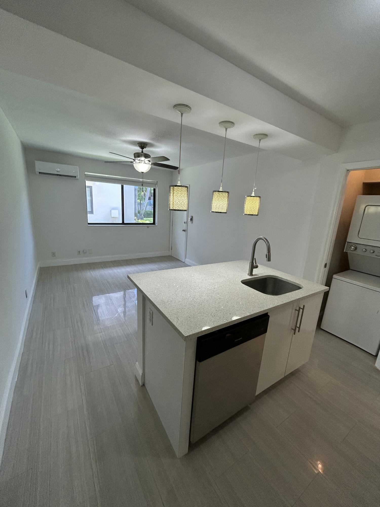 Now available for rent— a bright and updated 2-bedroom, 2-bath unit in Victoria Park. This first-floor home has a clean, modern feel with porcelain tile throughout, impact windows and doors, mini-split A/C, and plenty of natural light. The kitchen features white cabinets with quartz countertops, and both bathrooms have been beautifully redone. You'll also have the convenience of your own washer and dryer, one assigned parking spot, and the option to bring your pet. The location couldn't be better. Close to shopping, restaurants, parks, and just a quick drive to the beach, Las Olas, and Downtown Fort Lauderdale.