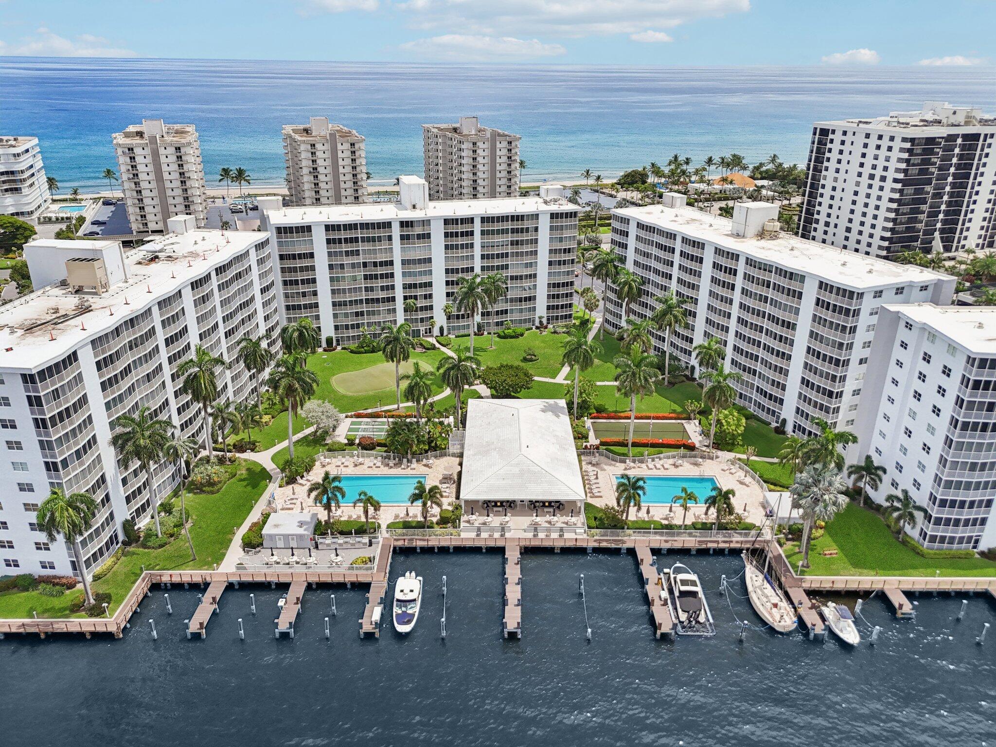 PRICED TO MOVE! Amazing opportunity to own and experience the allure of refined coastal living in this beautifully designed 2 bed, 2 bath residence, perfectly situated between the intracoastal and ocean. This is one of Highland Beach's most prestigious 55+ communities, Seagate of Highland. Nestled along the intracoastal just off A1A, this first floor condominium offers the rare convenience of direct patio access, creating a graceful connection between sunlit interiors and the serene outdoor surroundings.  Every detail of the community has been thoughtfully cared for, with the milestone inspection and reserve study complete. Recent enhancements include concrete restoration, new roofs and elevators. This property features impact glass and open living spaces that are bright, airy, & perfect for relaxed coastal living.  Life here unfolds like a private resort. Residents enjoy private deeded beach access with lounge chairs set against the turquoise Atlantic, the perfect backdrop for endless days by the sea. Two heated pools offer a tranquil retreat, and the welcoming clubhouse with its small fitness center provides opportunities for wellness and social connection. Leisure blends seamlessly with recreation through the putting green, shuffleboard, and bocce ball, while the waterfront barbecue area and boat slips along the Intracoastal invite moments of connection and relaxation.  With cable, WiFi, and water included in the well-funded association, this unit embodies both peace of mind and effortless sophistication. Perfectly positioned between the cosmopolitan offerings of Boca Raton and the vibrant charm of Delray Beach, it offers an unparalleled lifestyle where every day feels like a coastal escape. Concrete restoration, Reserve Study, SIRS complete. New roofs, new elevators, freshly painted buildings, new chillers on the roof and HEALTHY RESERVES. Boat slips available at $10 per linear foot paid twice a year. Schedule your private showing today!