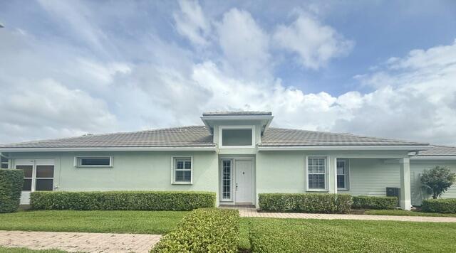Welcome to this charming townhouse in Stuart's desirable Willoughby Cay community. This single-story residence offers 1,657 square feet of finished living space with three bedrooms and two bathrooms, providing comfortable accommodations for various lifestyles. The two-car garage adds convenience and storage for vehicles and personal items with second fridge. The thoughtful layout and lake views make this Willoughby Cay home a perfect home. This beautifully maintained home is being offered as a rental for the very first time. Lovingly cared for by its owner, the property has been kept exceptionally clean and well maintained throughout.
