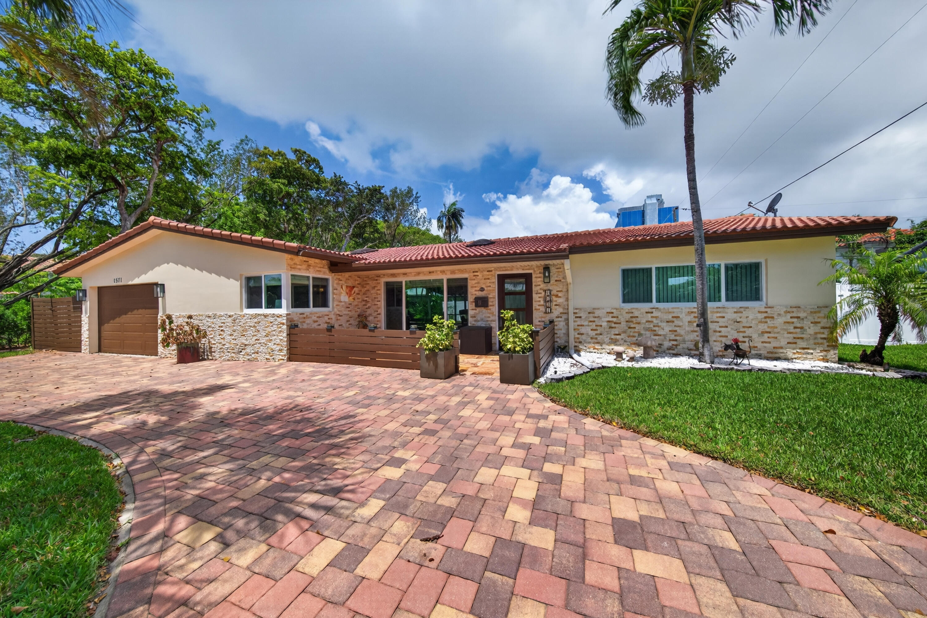 Beautiful turn key home offering split 3 bedroom/ 2 bath floor plan with pool at end of quiet street. Minutes to beach and shopping. House offers following recent upgrades: All plumbing lined, New AC 2025, New Water heater 2024, New Dishwasher 2025, New exterior painting 5/2026 and roof pressure cleaned and sealed 5/2026, Updated exterior lighting, New Swim Spa control panel on pool 2026. One car garage with side of house storage for nice size boat or RV., Large work shed also. Fully open air sliding glass windows from living to patio for maximum walk through. Hurricane windows through out home. Ex-large screened in back patio with ceiling fans. Resort style above pool with jets. Open kitchen for entertaining.
