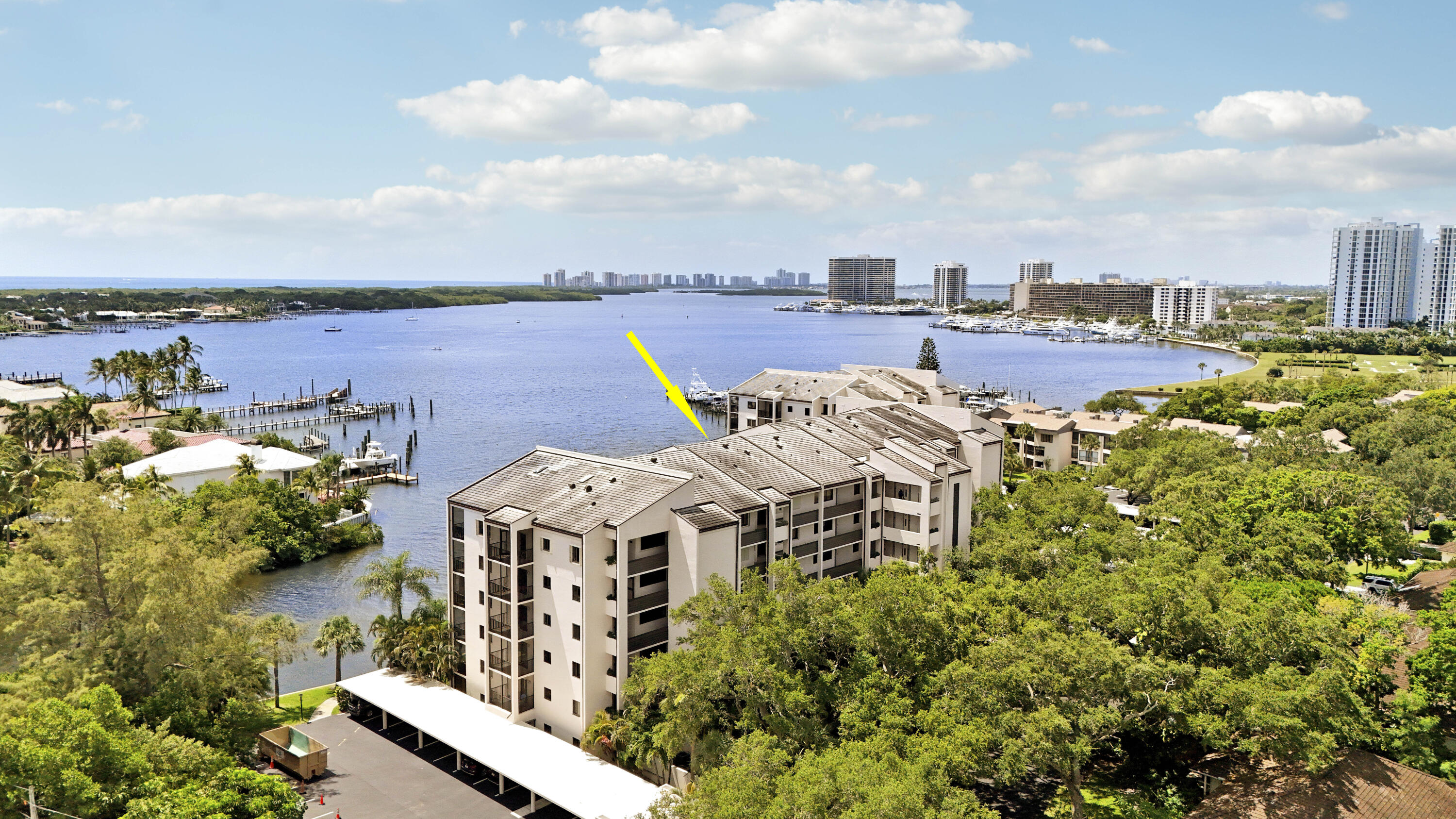 INTRACOASTAL DELIGHT! Outstanding waterfront views from this 4th Flr Condo in Desirable Twelve Oaks Community,nestled in a lush park-like setting.Ideally located just east of US1 & PGA Blvd, this Community boasts a Private Marina for 30-50 Ft. boats (Electric & Water Included).This thoughtfully designed 2BR/2BA Condo w/Eat-In Kitchen & renovated Primary Bath is only enhanced by the covered balcony with spectacular Sunrises to greet each new day. Amenities include a Clubhouse, Community Pools, Tennis Courts, & Bike Storage.Exceptional 24Hr. security at the single entry gate insures privacy at this lavishly landscaped enclave w/massive specimen oak trees. Sandy beaches of the sparkling Atlantic Ocean are only minutes away,as well as SUPERB  Shopping & Dining. Claim your slice of PARADISE! Flat Roof Age: 2025. Tile Roof has Reserves for 2030 replacement. A/C: 2017, HWH: 2019.  Information & measurements are deemed reliable, but not guaranteed.