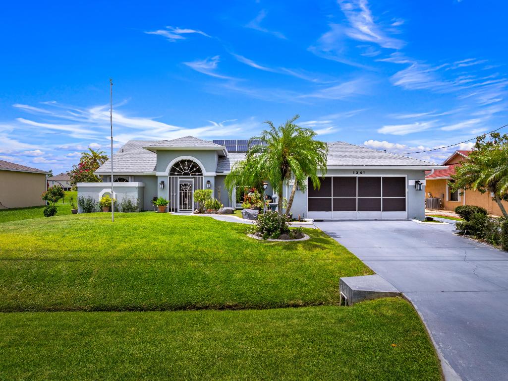 Canal-Front Pool Home in Port St. Lucie  Get ready to fall in love with this beautifully maintained home offering over 2,000 sq ft under air and packed with features made for Florida living! Enjoy a screened-in heated pool powered by separate solar panels., spacious under-truss patio with summer kitchen, and direct access to the C-24 Canal with a private deck and dock—complete with water, electric, and lighting. Inside, you'll find soaring vaulted ceilings, a granite kitchen with stainless appliances, and tons of natural light. sprinkler system.  -SOLAR PANELS ARE INCLUDED!!!- (PAID IN FULL)  -Accordion hurricane shutters - Cabana bath & Roman tub -Peaceful waterfront setting -Conveniently located near schools, shops, and parks.