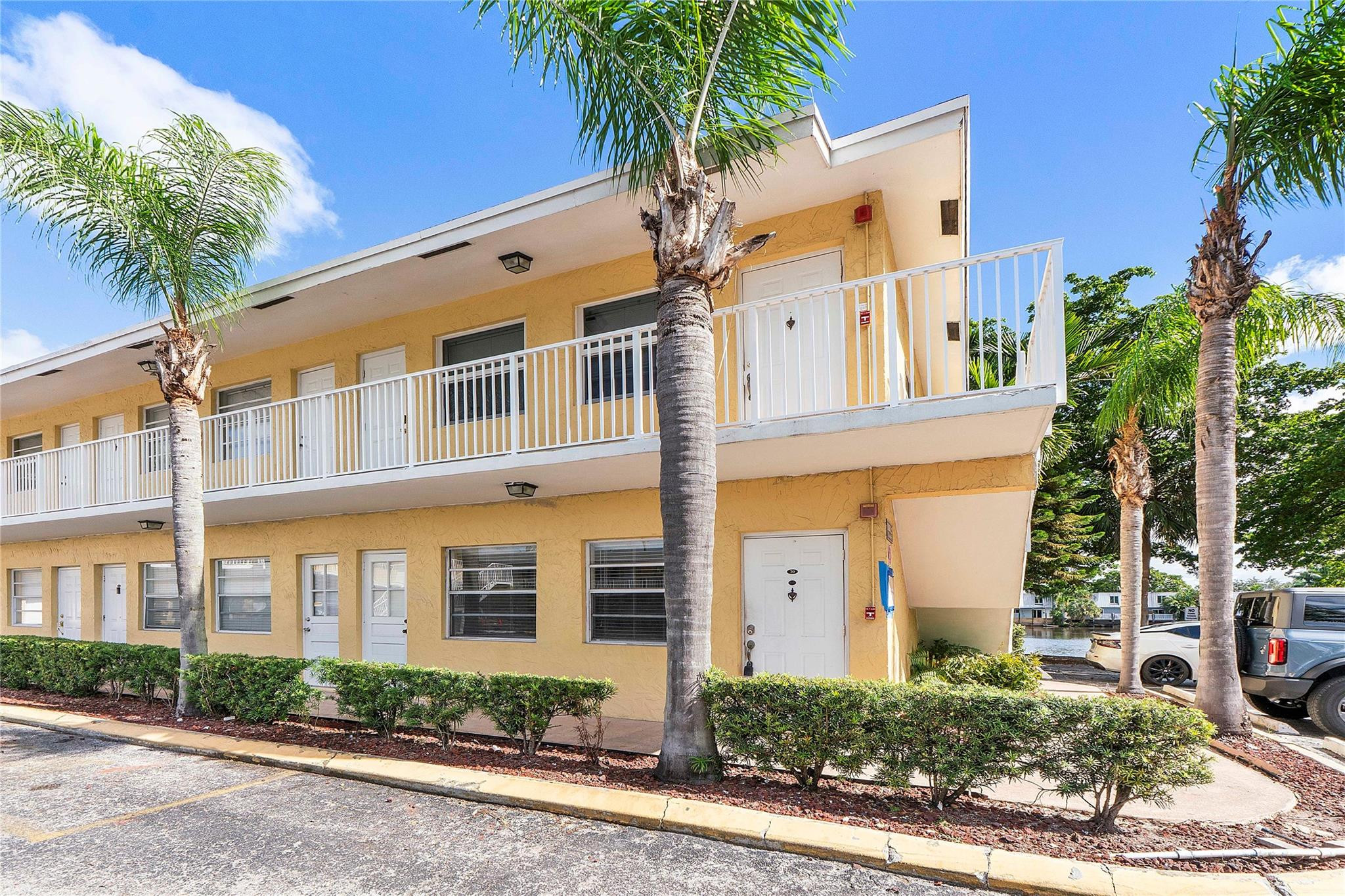 Discover a chic 2-bedroom, 1-bath corner unit condo with breathtaking lake views in Downtown Oakland Park. This light-filled property features a modern kitchen with sleek granite countertops and two spacious bedrooms, each equipped with its own large walk-in closet.  Currently tenant-occupied, this unit offers a seamless opportunity for an investor looking to add a performing asset to their portfolio. The property is ideally located near the Funky Buddha Brewery and vibrant local hotspots, ensuring long-term appeal in a high-demand area. With immediate leasing potential and a prime urban location, this is a turnkey addition to any real estate strategy. Don't miss out on this exceptional investment—reach out to schedule a viewing today!