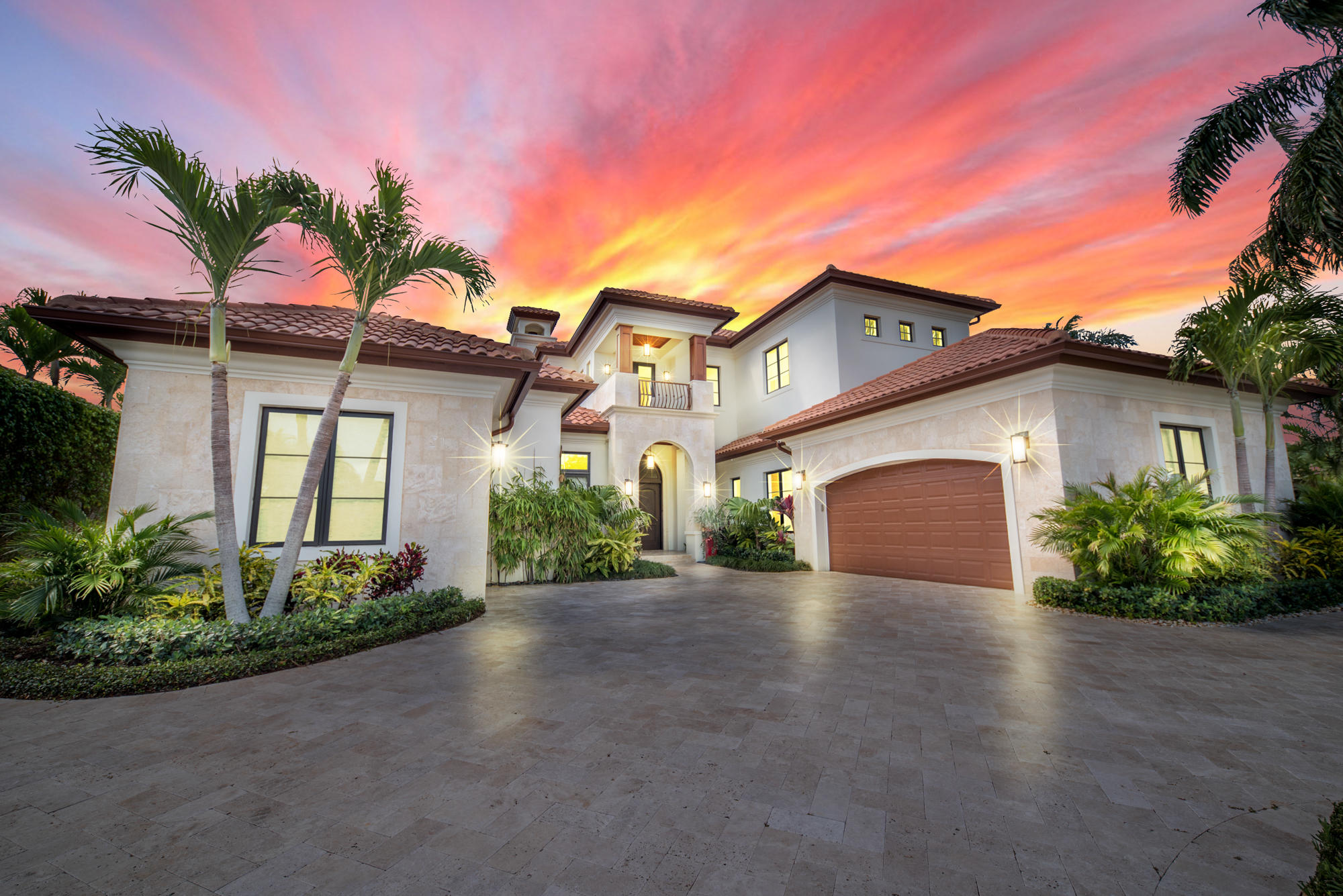 Seconds to the intracoastal. PRIVATE ISLAND. Recently completed by top designer, Coastal Contemporary 5BR/6 1/2BA 5700 sq/ft custom home loaded w/every architectural detail. Stone/concrete façade w/waterfall stonewall entry. His/her offices. Floor to ceiling 24ft ledgestone wall w/gas FP. Walls of glass let the outside in.  Chefs eat in kitchen w/white cabinetry, La Cornue 6 burner gas stove/oven, add'l oven, 2 freezers,2 refrigerators, Wine wall refrigerator.  First floor MBR suite w/his/her separate baths. Her bath w/full stone shower wall, marble slabs, dual sinks, free standing tub, 3 huge walk in closets. Add'l 1st flr suite. Elevator to 3 add'l VIP suites. Large heated pool/waterfall spa w/expanded marble patio. Impact windows/doors. Gas Firepit. Summer Kitchen. Full House GENERATOR