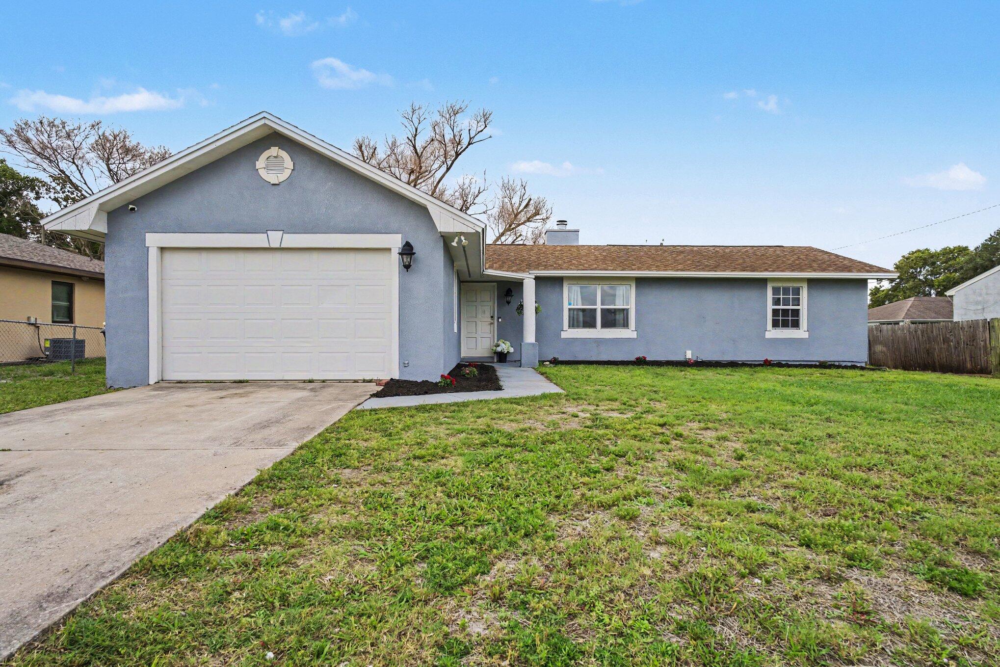 Whether you're a first-time homebuyer or looking to downsize, this home checks all the boxes! Featuring 3 bedrooms, 2 bathrooms, and a spacious 2-car garage, it offers both comfort and convenience. Enjoy outdoor living with a large fenced backyard and a screened-in lanai—perfect for relaxing or entertaining. Roof installed 2019 Priced to sell, this opportunity won't last long!