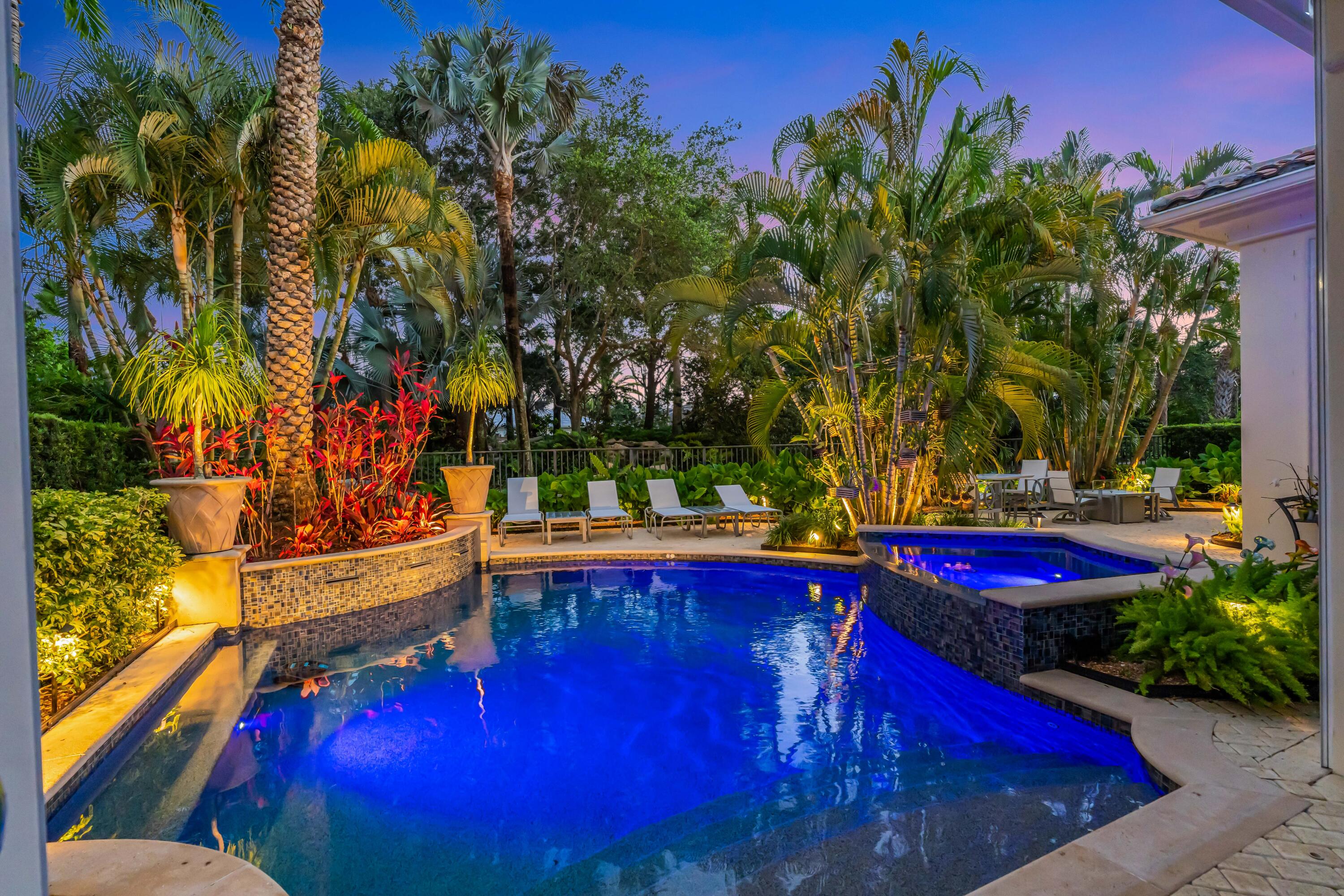 Located within the prestigious Old Palm Golf Club, this impeccably maintained residence offers the perfect blend of luxury, privacy, and effortless south Florida living. Featuring 3 bedrooms and 3 full plus 2 half baths, the home showcases beautifully designed indoor and outdoor spaces with lush, resort-style landscaping that creates a truly serene backyard retreat. Expansive outdoor living areas are surrounded by mature tropical plantings, offering the ideal setting for entertaining or relaxing in total privacy.  Inside, the home has been meticulously cared for and thoughtfully maintained, complete with the added peace of mind of a whole-house generator. The spacious layout flows seamlessly for both everyday living and entertaining. Ideally situated in the heart of Palm Beach Gardens,  Located within the prestigious Old Palm Golf Club, this impeccably maintained residence offers the perfect blend of luxury, privacy, and effortless Palm Beach living. Featuring 3 bedrooms and 3 full plus 2 half baths, the home showcases beautifully designed indoor and outdoor spaces with lush, resort-style landscaping that creates a truly serene backyard retreat. Expansive outdoor living areas are surrounded by mature tropical plantings, offering the ideal setting for entertaining or relaxing in total privacy.  Inside, the home has been meticulously cared for and thoughtfully maintained, complete with the added peace of mind of a whole-house generator. The spacious layout flows seamlessly for both everyday living and entertaining.  residents enjoy close proximity to world-class dining, shopping along PGA Boulevard, The Gardens Mall, fine restaurants, private airports, and some of South Florida's most beautiful beaches including Juno Beach and Jupiter Beach. Old Palm is known for its exceptional location and luxury lifestyle offerings, including a Raymond Floyd-designed golf course, world-class clubhouse, fitness amenities, spa services, and resort-style living. Importantly, there is no mandatory golf membership requirement with this home, offering flexibility rarely found within the community.