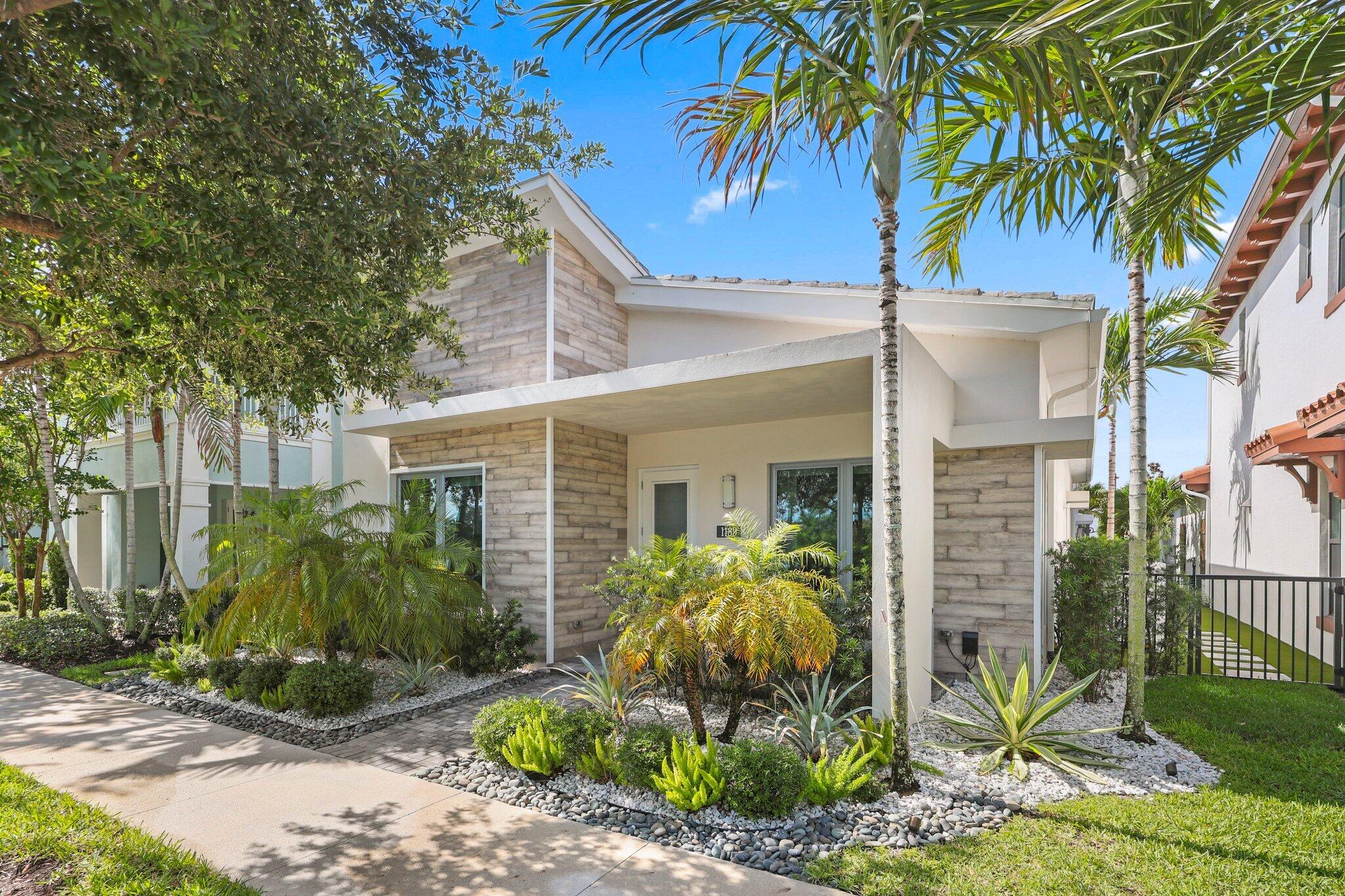 Immaculate and beautifully upgraded, this one-story home in Alton offers wood floors throughout, serene views across to the lake, and a prime location just a short walk from the vibrant Alton Town Center. Nearly every available upgrade has been added, creating a luxurious, move-in-ready retreat.Inside, you'll find Lutron lighting, designer fans, Hunter Douglas window treatments,  phone controlled locking system and California Closets for exceptional storage and style. The chef-inspired kitchen features soft-close upgraded cabinetry, a built-in Monogram statement refrigerator, double ovens, a vented hood, upper glass-front display cabinets with LED lighting, and wood shelving in the walk-in pantry. A spacious 630 sq. ft. casita above the garage serves as the third bedroom, complete with an en-suite bath. This suite also includes a convenient outdoor cabana bath, perfect for entertaining and for use while enjoying the patio and natural gas grill.All bathrooms include upgraded countertops, floor-to-ceiling porcelain tile, and elegant seamless glass showers for a spa-like feel.Residents enjoy access to The Club at Alton, featuring an impressive resort-style pool, state-of-the-art fitness center, and more.
