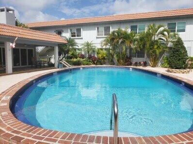 Wonderful Complex. Very well kept. Clean and a pleasure to show. Tropical Courtyard with heated inground pool. Redone Clubhouse with kitchen. Wi fi in pool area. 20% down required. credit score of 650 minimum score. 1 small pet allowed per unit. 20 lbs maximum. No assessments scheduled. Good reserves. A true hidden treasure just 1 mile to Wilton Drive night life.  20% down required. No renting for the 1st 2 years. 1 small pet up to 20 lbs.