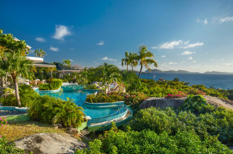 Refined resort-style living awaits at this recently renovated Virgin Gorda, British Virgin Islands generational 'Valley Trunk' enclave on landscaped 18 freehold acres with 1,100± feet of Caribbean white-sand beachfront, overlooking dazzling Sir Francis Drake Channel views. Living areas of the ten-bedroom villa open to the freeform 80-foot infinity pool, while the tennis court adjoins the four-bedroom guest villa. Features include a modern interior redesign with a coastal aesthetic; cinema screening room; lounge with a wet bar; luxe primary suite offering panoramic views of the ocean, islands and sunset; separate manager's house-staff accommodations. wander garden pathways to explore your property's flora and fauna, play in the rock pools, snorkel in dramatic underwater seascapes! DISCLAIMER: Information published or otherwise provided by the listing company and its representatives including but not limited to prices, measurements, square footages, lot sizes, calculations, statistics, and videos are deemed reliable but are not guaranteed and are subject to errors, omissions or changes without notice. All such information should be independently verified by any prospective purchaser or seller. Parties should perform their own due diligence to verify such information prior to a sale or listing. Listing company expressly disclaims any warranty or representation regarding such information. Prices published are either list price, sold price, and/or last asking price. The listing company participates in the Multiple Listing Service and IDX. The properties published as listed and sold are not necessarily exclusive to listing company and may be listed or have sold with other members of the Multiple Listing Service. Transactions where listing company represented both buyers and sellers are calculated as two sales. "No payments made until title passes" Some affiliations may not be applicable to certain geographic areas. If your property is currently listed with another broker, please disregard any solicitation for services. Information published or otherwise provided by seller, listing company or its representatives is deemed reliable but are not guaranteed and subject to errors, omissions, or changes without notice. Copyright 2026 by the listing company. All Rights Reserved.