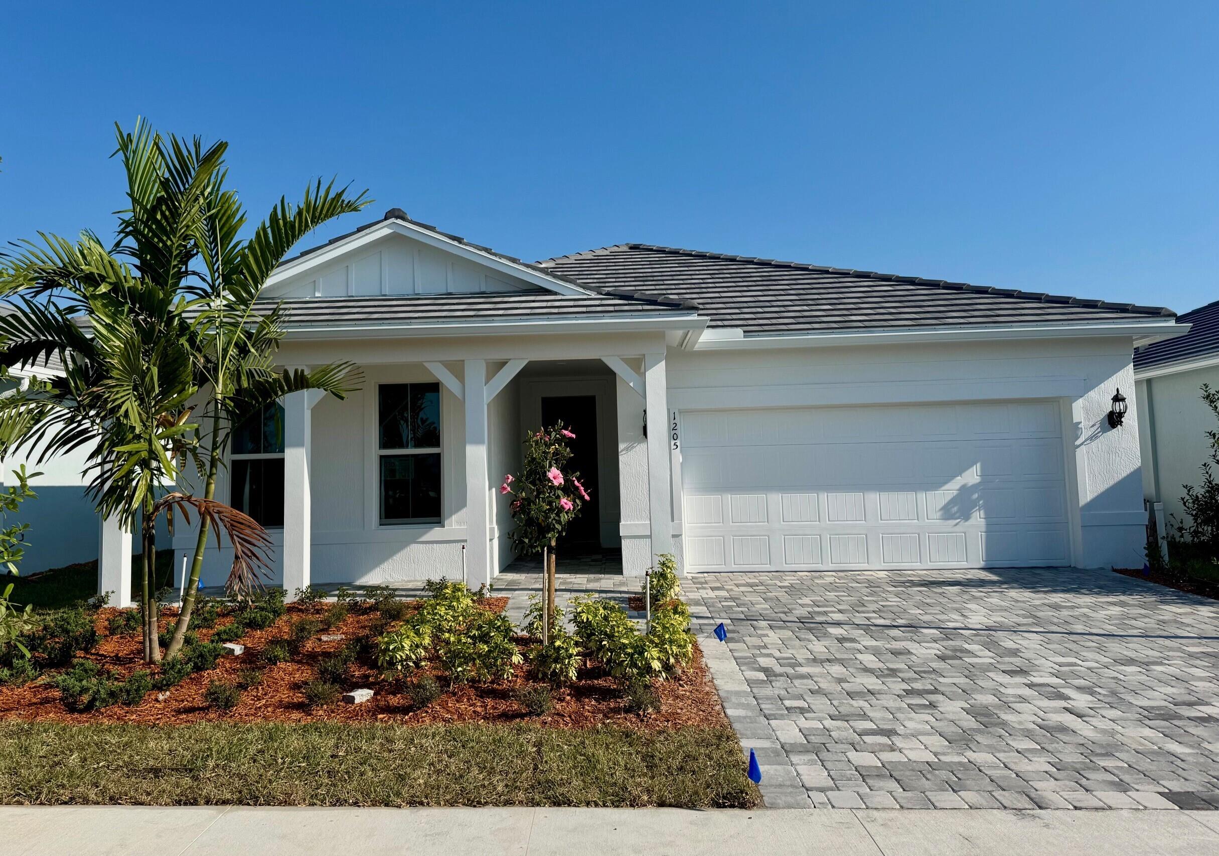 UNDER CONSTRUCTION: Welcome to DiVosta's nearly sold out Signature community in Vero Beach.  Whether this is a winter getaway or your permanent address, the Palmary plan offers split bedrooms and enclosed den.  Enjoy entertaining in the gracious Gathering room and impressive Built in Kitchen with ample cabinets and welcoming island.  Floors have been enhanced with wood look planks throughout.   Live mere steps from the world class Amenity Campus  featuring a resort style pool, Pickleball and Fitness Center.