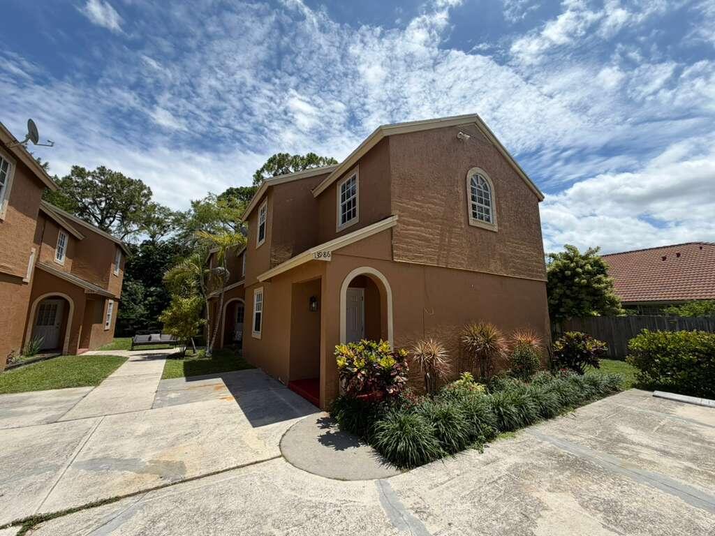 Spacious 2-story, non-hoa, townhome, featuring 3-bedrooms, 2.5-bathroom corner unit located in the heart of Wellington, ready for a quick move-in! Well maintained, freshly painted and touched-up, with spacious bedrooms- all upstairs, a half bathroom downstairs and 2-full bathrooms upstairs, new cabinets in kitchen with newer appliances, screened-in patio with storage room, and a full size new washer & dryer in the unit. This complex has a shared yard and parking. Centrally located close to shopping, mall, restaurants, top rated schools, entertainment, parks, minutes from Publix and much more!