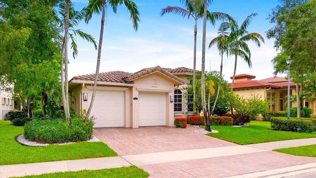Welcome to a pristine lakefront home in the highly desirable HERON BAY community. Impeccably maintained and truly move-in ready, this residence showcases pride of ownership throughout. Bright, open living spaces feature soaring ceilings, abundant natural light, open kitchen, custom built-ins, French doors, and many more upgrades. Outside, enjoy breathtaking lake views from the screened patio, perfect for relaxing or entertaining. Located on a premium waterfront lot in one of Parkland's most sought-after communities, Heron Bay offers top end resort style amenities, gated security, and access to top-rated schools. A rare opportunity to own a meticulously cared-for home with exceptional water views in an unbeatable location!!!