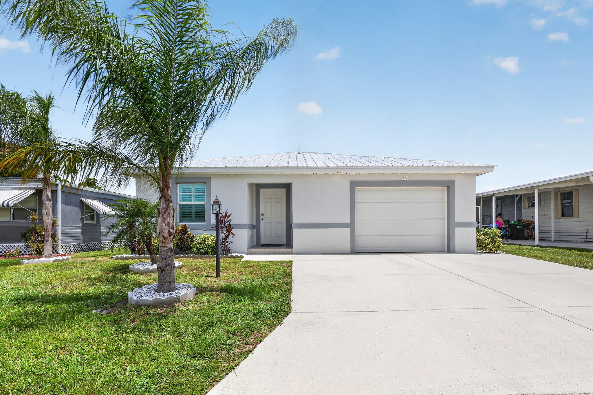 Durability meets Elegance w/ this Furnished 1bed/1.5bath/1Den 2021 home.  Built to last, w/ Concrete Block Construction, STORM IMPACT WINDOWS & METALROOF built overPlywood for maxstrength. Endless Fishing, a Grill Area, Small Yard Perfect forPups, Gardening &More! Use the KeyPadEntry to enter & the beauty continues w/OpenConcept,Vaulted Ceiling,LEDRecessed Lights,GRANITECounters, SS appliances,Pantry, Bfast Bar. Master w/ ensuite & Walk-in Closet. Den serves as 2nd Bedrm w/ PullOut Sleepr Couch! Storage w/ AC! ScreenedPorch w/ WaterViews. PRIMELOCATION; Beach, Grocery,Postal,Banks,Hospital, Pharmacy&More! LotLease 707.36 incl Trash,Lawn,Private Free Golf,Heated Pool,Fitness, Pickleball/Tennis, BINGO,Shuffleboard,Bocce, Gym,Library,Cards,MahJong, Workshop,Parades,Dinners, Dances,Trips&More!