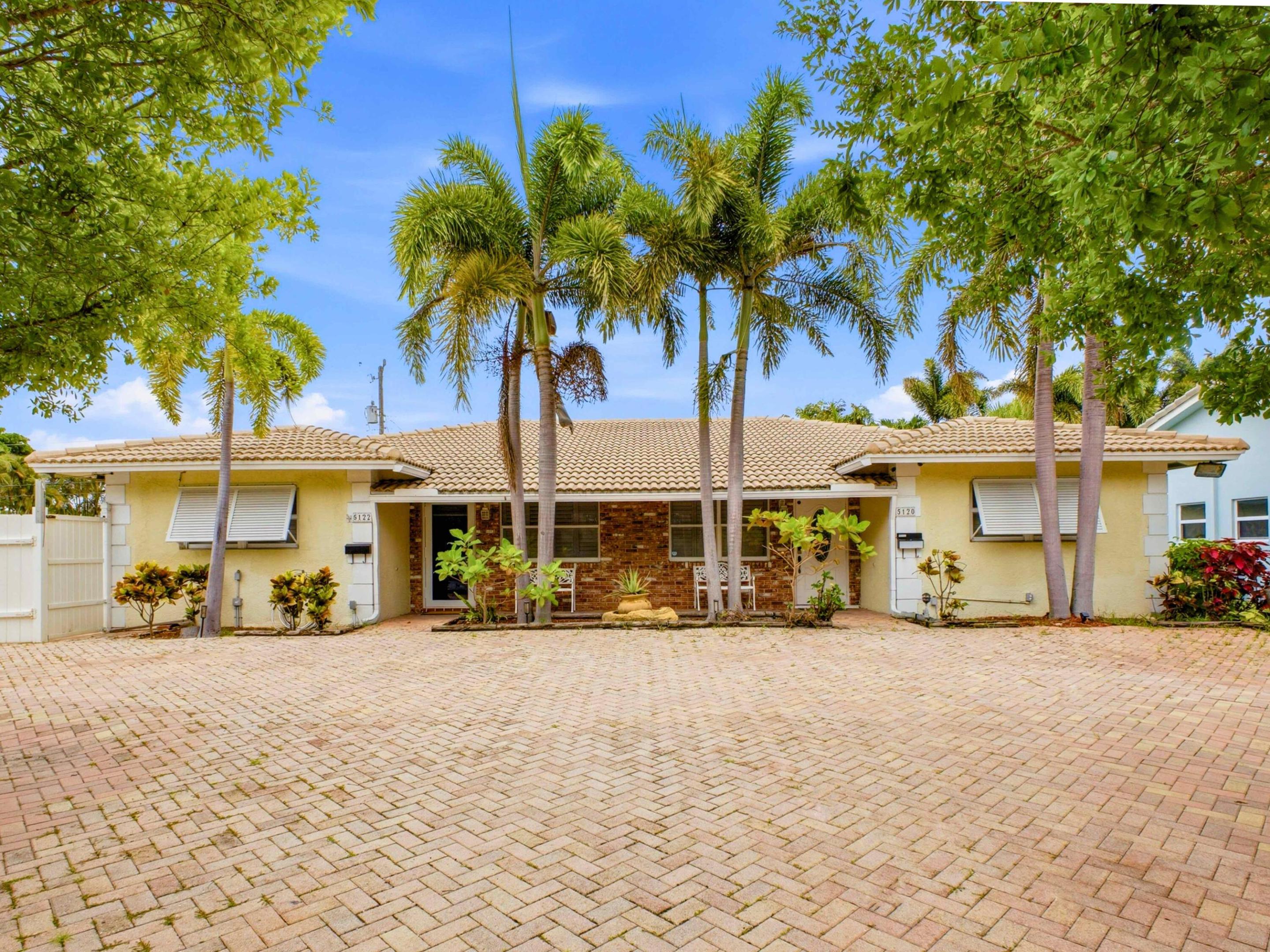 Fully Furnished Turnkey 3BR/2BA Retreat in Desirable Lighthouse Point! Available for short-term or annual rental. This beautifully renovated half-duplex offers the perfect blend of comfort, style, and coastal living. Ideally located east of Federal Highway and just 8 minutes to Deerfield Beach, 10 minutes to Hillsboro Beach, and 14 minutes to Pompano Beach, with easy access to the Intracoastal Waterway, marinas, waterfront dining, shopping, parks, and more. Beautifully decorated and move-in ready, this home features luxury waterproof vinyl flooring throughout with no carpet, impact windows, plantation shutters, newer appliances, and a full-size washer and dryer. The bright and inviting floor plan offers comfortable living spaces, spacious bedrooms with walk-in closets, and tasteful furnishings that create a warm coastal feel. Step outside to the covered patio with a panoramic picture-frame screen enclosure, offering unobstructed views and the perfect setting to relax, entertain, or enjoy Florida's beautiful weather. The fully fenced backyard provides plenty of outdoor space, while ample parking and no HOA add even more convenience. A rare opportunity to enjoy the best of Lighthouse Point living in a beautifully updated, fully furnished home. Whether you're looking for a short-term getaway or a longer stay, this exceptional property is ready for you. Schedule your private showing today!