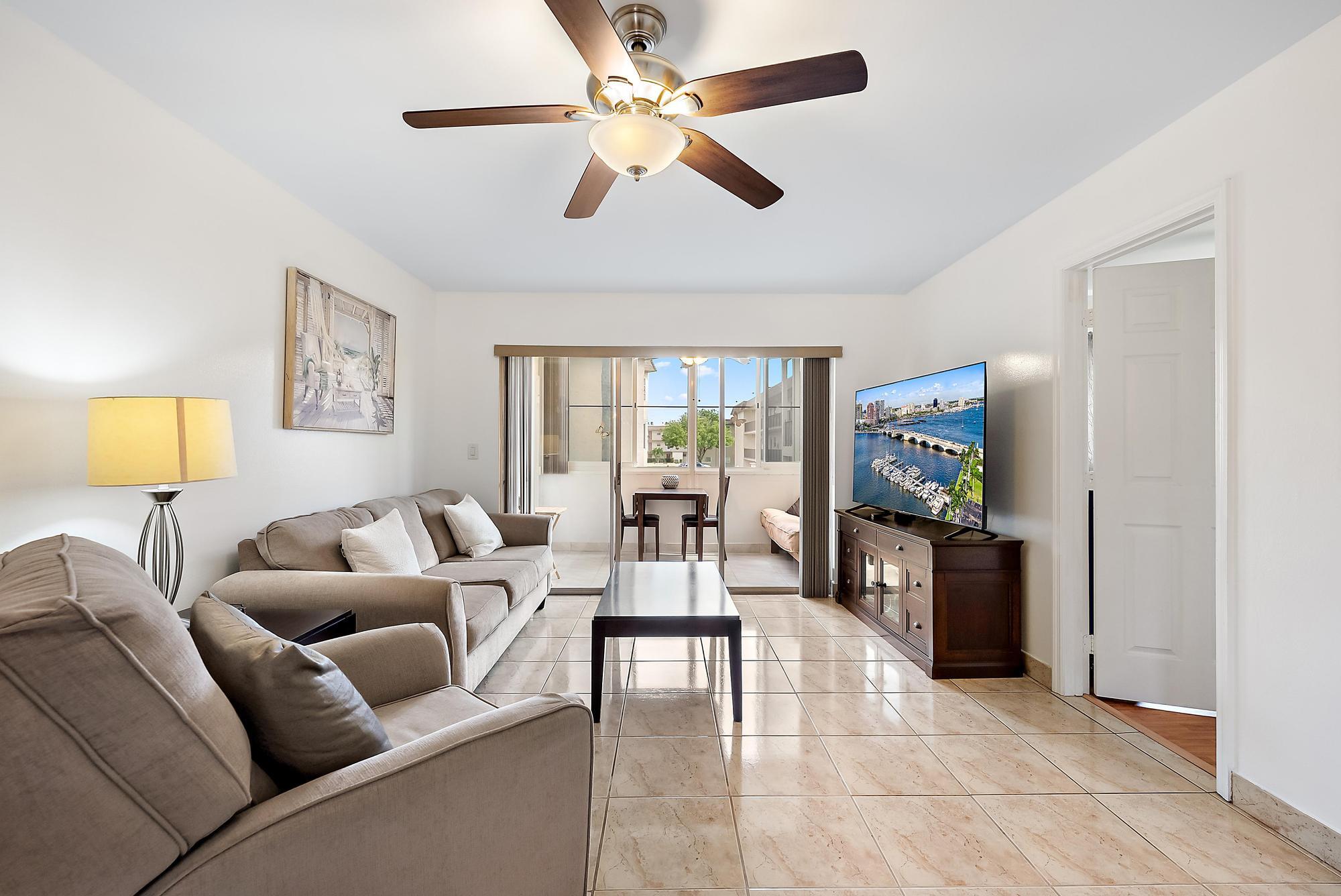 Buyer incentives available! Start earning from day one with this tenant-occupied 2nd-floor Bahama model condo—featuring an excellent tenant in place with reliable, guaranteed income. Enjoy added value and peace of mind: the roof assessment will be paid in full at closing, plus a brand new water heater and a 7-year-old A/C.  Inside, you'll find a second enclosed bedroom with a closet and window, fresh paint, an assigned parking spot, and a large enclosed porch with serene garden views. Condo fees conveniently include water, cable, and internet.  The community offers a vibrant lifestyle with a clubhouse and dual pools, plus shuffleboard, bocce, a small putting green, arts & crafts, exercise classes, and line dancing—and a bus stop just steps from your door for easy access. Schedule your private showing today a smart, income-producing opportunity in a high-demand community!