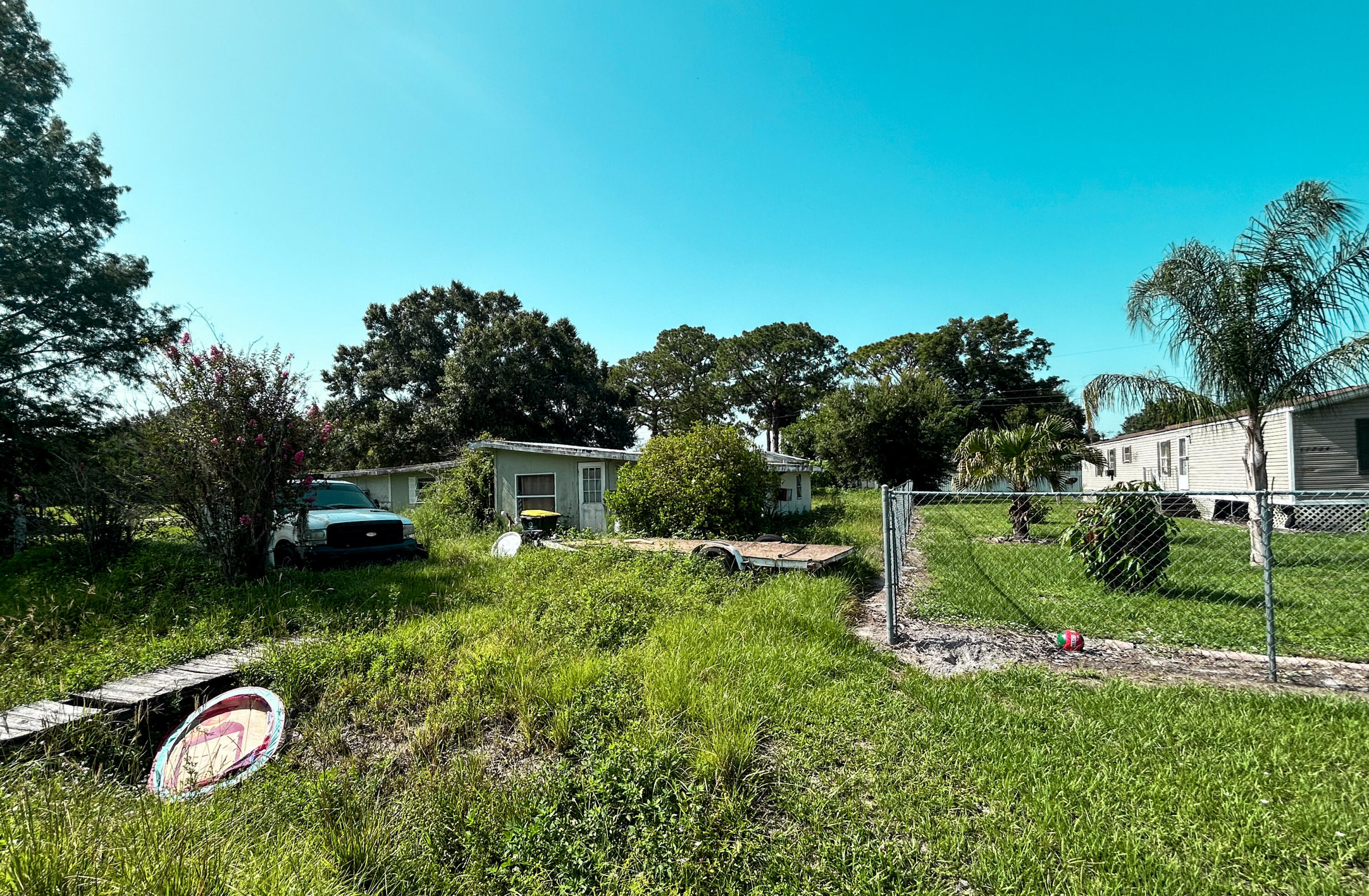 Investor Special! Opportunity awaits with this CBS 3BR/1BA home located on a 0.34-acre corner lot in Kissimmee River Estates. Offering 1,028 SF of living space, this property is ready for a full renovation and presents an excellent opportunity for investors, contractors, or buyers looking to add value. The spacious corner lot offers plenty of potential for future improvements and outdoor living. Conveniently located near US-441, shopping, dining, schools, and the recreational opportunities of Lake Okeechobee. Property is being sold AS IS. Cash offers only.