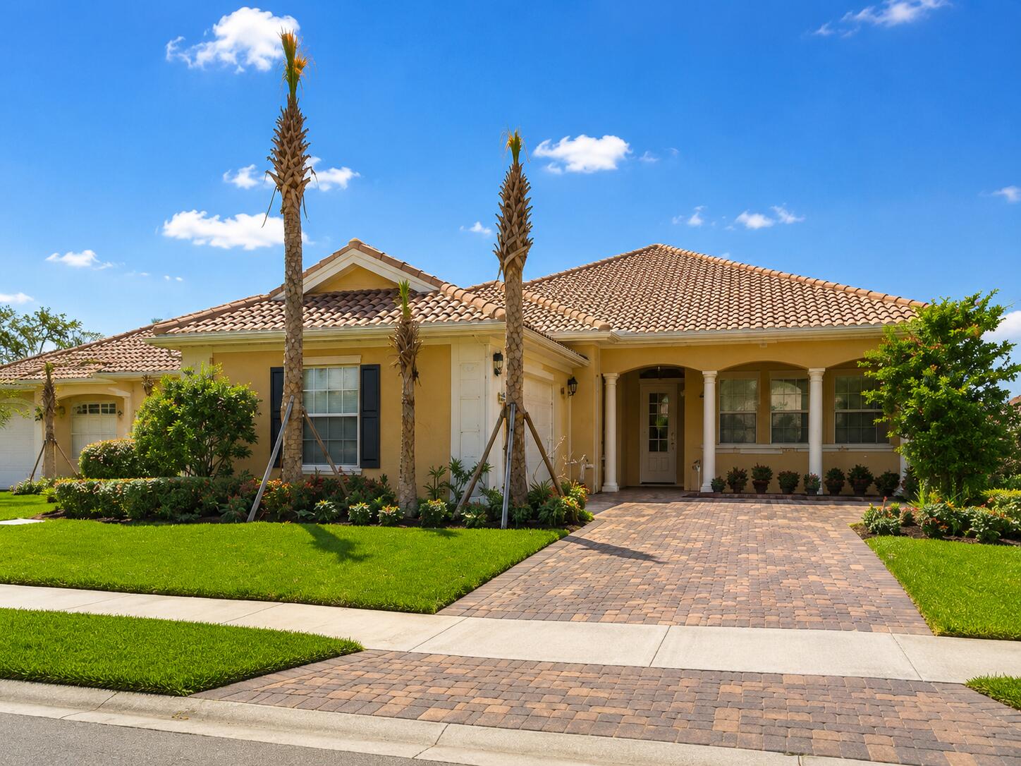 Exceptional waterfront Carlyle model in the heart of Tradition on an oversized 11,812 sq ft lot. This 4-bedroom, 3-bath home features 2,487 sq ft, impact windows and doors, 2017 A/C, 2020 water heater, central vacuum, built-in alarm, and an open one-story layout designed for comfortable Florida living. Enjoy peaceful water views, generous indoor and outdoor living space, and a premium location near Tradition Town Center, shopping, dining, hospitals, and I-95. A rare opportunity to own one of the community's most desirable waterfront homes.