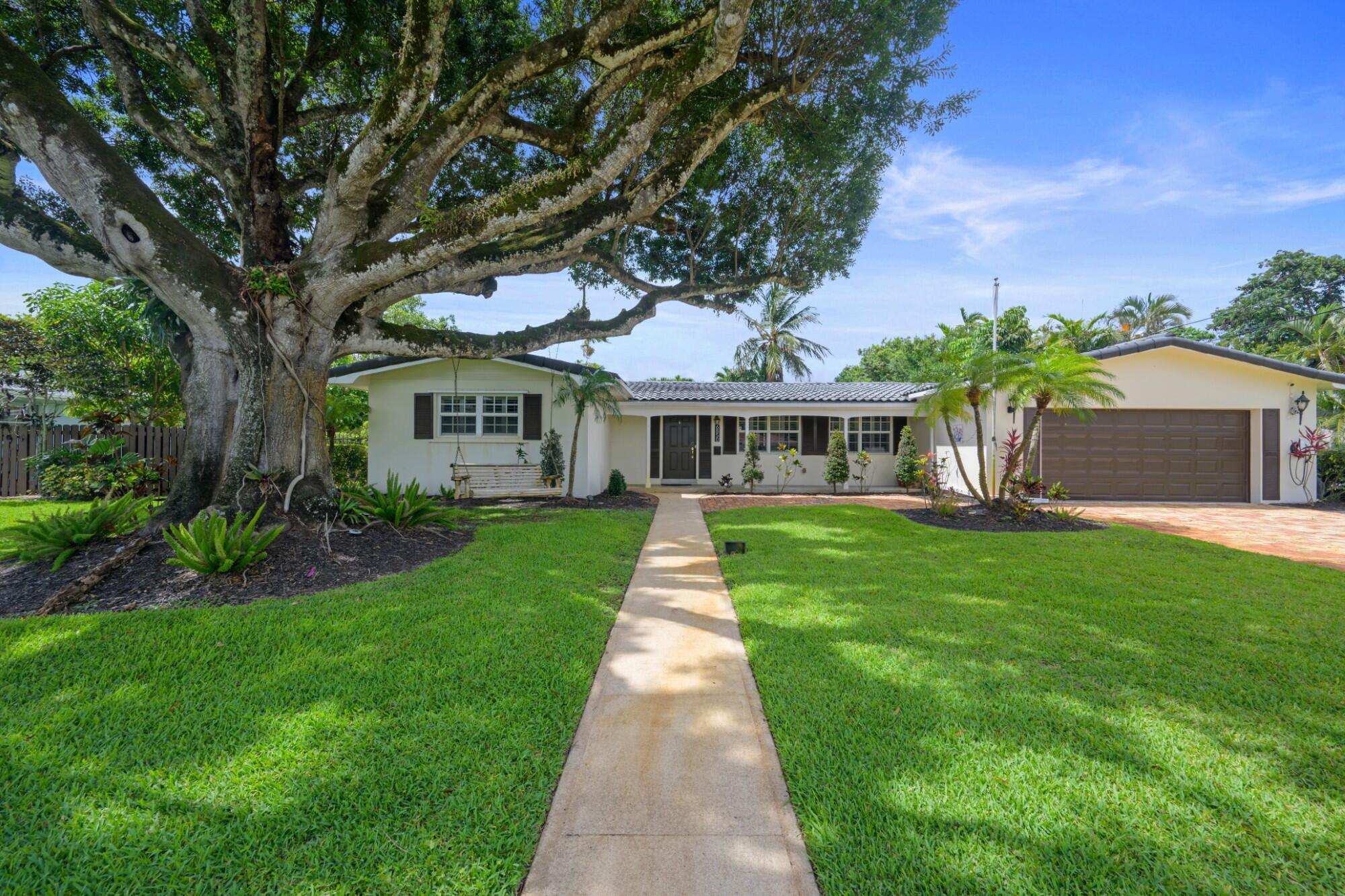 Welcome to Paradise. Oversized lot (1/3 of an acre approximately) Very large 4-bedroom 3-bathroom, split bedroom home 2 primary bedrooms on beautiful lot, Cul de sac street, huge, covered patio overlooking pool and lushly landscaped rear yard. Impact windows or accordion shutters throughout. Large inside laundry room. Formal living room and large eat in kitchen family room. Full house automatic generator. 2 air conditioning units.