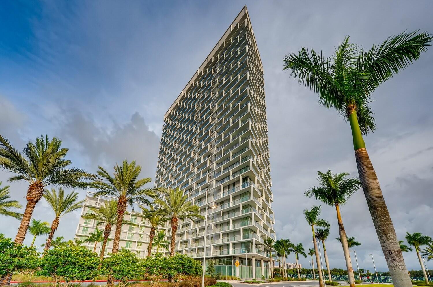 Beautiful 2-bedroom, 2-bath residence located on the 21st floor of One Metropica, offering spectacular east-facing views of the Fort Lauderdale skyline. This modern unit features sophisticated interiors designed by YOO Design Studio, with Italkraft kitchen cabinetry, imported porcelain tile flooring, and premium Hansgrohe plumbing fixtures. Floor-to-ceiling impact windows provide abundant natural light and showcase the stunning views, while the spacious layout includes a large walk-in closet. Enjoy resort-style amenities in a lush, tropical setting. Ideally located in a low-traffic, highly convenient area close to premier shopping, dining, and major highways.