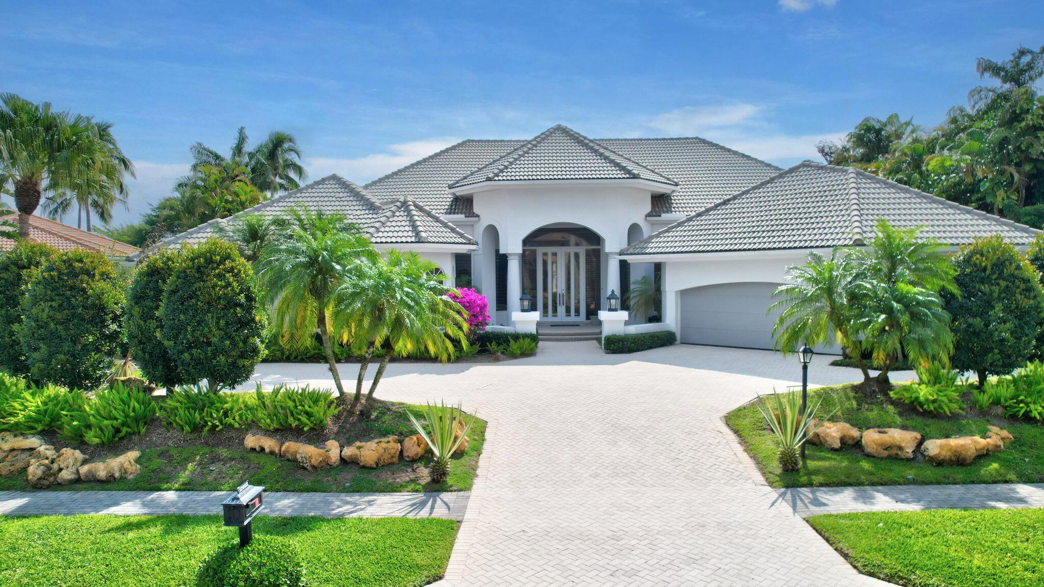 Beautifully renovated 3 bedroom + office home on an OVERSIZED LOT (0.45 acre) in exclusive Lake Estates with magnificent large private lake views in St. Andrews Country Club! The interior is light and bright, with an open floor plan and floor-to-ceiling windows. Renovated kitchen features all Miele appliances with a gas cooktop. The master suite has renovated his and her bathrooms. All guest bedrooms are ensuite, and all bathrooms have been renovated. Outside is a very spacious patio with a large covered area and a beautiful BBQ area.