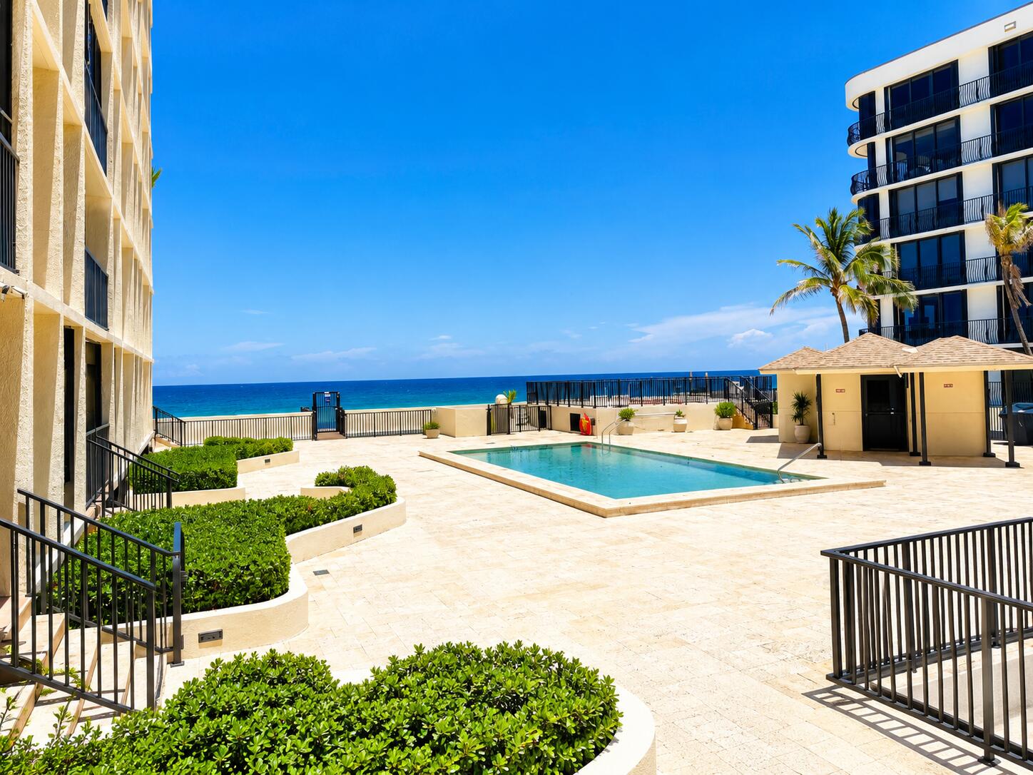 Welcome to the newly transformed Dune Deck Condominium, where recent community-wide renovations have elevated this oceanfront gem into one of the most desirable residences on the south end of Palm Beach Island. Extensive improvements, including a beautifully redesigned lobby and common areas, a new seawall, refreshed oceanfront pool and spa, completed concrete restoration, and healthy reserves, provide peace of mind and an exceptional coastal lifestyle. Residence #103 has been meticulously renovated and is move-in ready. The bright, open interior features stunning new porcelain tile flooring, a spacious designer kitchen with  LG stainless steel... appliances, including a full-size washer and dryer, and tasteful finishes throughout.  Perched on the second floor, this residence offers sweeping ocean views from the expansive balcony. Step directly from your balcony to the beautifully maintained pool, Jacuzzi, private beach, and the Atlantic Ocean just moments away, creating a seamless indoor-outdoor living experience.  Ideally located, Dune Deck is just a short stroll to the shops and restaurants at Manalapan Plaza and the world-renowned Eau Palm Beach Resort & Spa. Enjoy the best of South Florida living with Worth Avenue only 9 miles to the north, vibrant Atlantic Avenue in Delray Beach just 9 miles to the south, and convenient access to I-95 less than 2 miles away.  Experience luxury oceanfront living where every day feels like a vacation. Schedule your private showing today and discover why Dune Deck is one of Palm Beach's best-kept secrets.