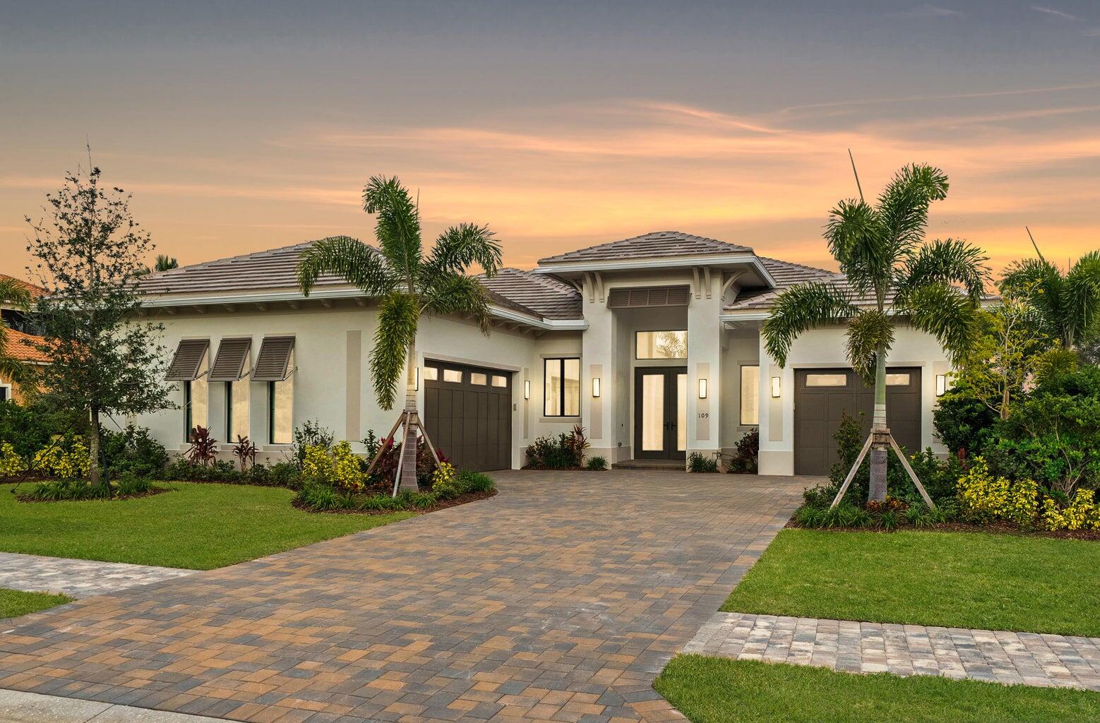 The Madrona Plan provides elevated living in this move-in ready masterpiece. This 3-bedroom, 4.5 bath home spans 3,204 sq. ft. of air-conditioned living space and over 4,400 sq. ft. total. The 3-car split garage affords room for a golf cart and storage area.  Step inside to soaring 12-foot volume ceilings, exquisite Arhus Paja wood tile flooring throughout the home. The kitchen features white stacked cabinets accented with gold hardware, white quartz countertops, a waterfall island, Café appliance, including a gas cook top and a 42'' built-in refrigerator. Entertain effortlessly in the clubroom, great room or retreat outdoors to an expansive covered patio and resort-style pool with deck jets and a sun shelf bubbler. Home is designed with a cabana bath for added convenience.