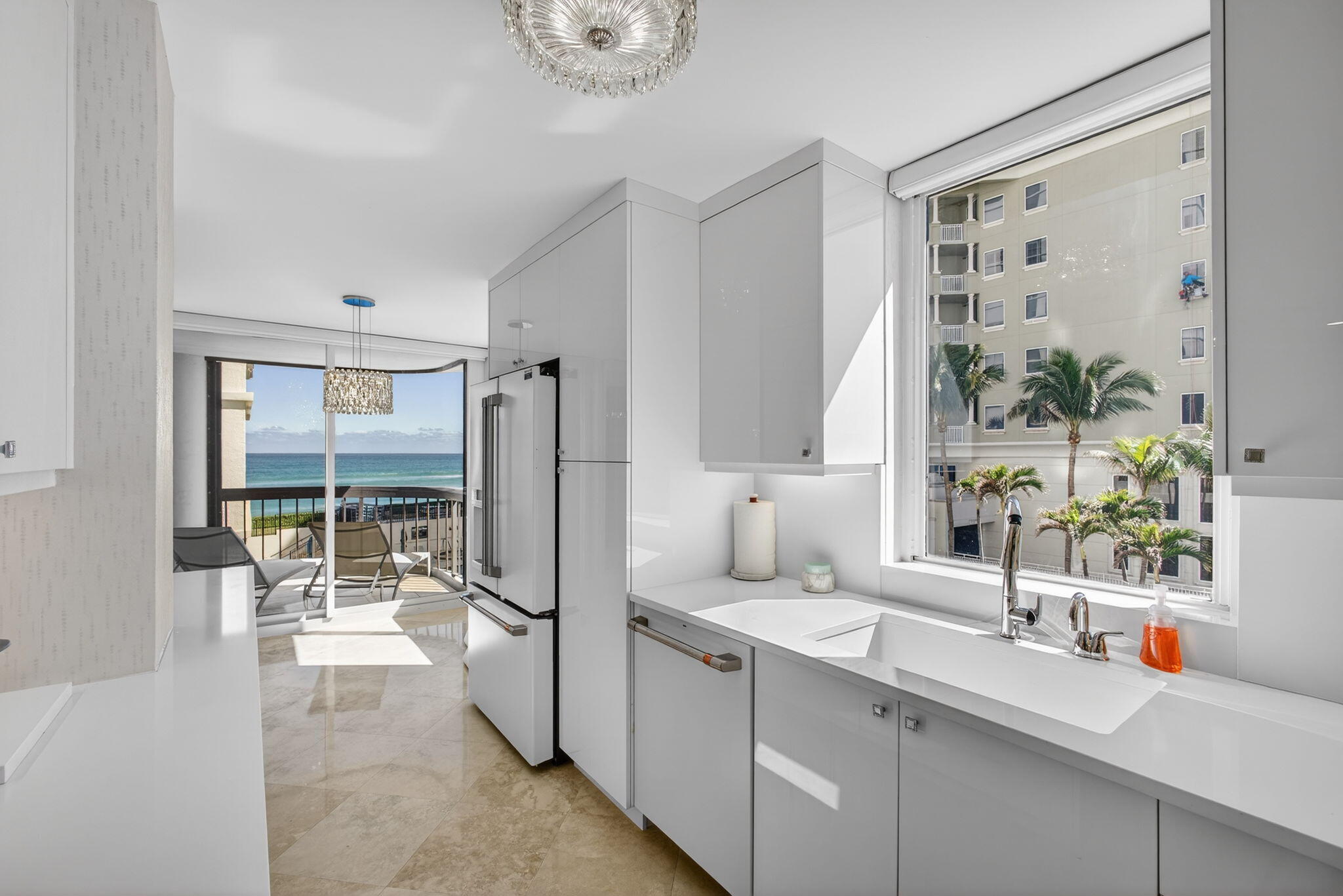 This meticulously renovated unit spared no detail in its transformation. Located in the prestigious Eastpointe community on Singer Island, it offers an unparalleled lifestyle with resort-style amenities, including a fully equipped fitness center, tennis courts, and private beach access.  The interior features stainless steel appliances, hurricane impact sliders, and designer finishes throughout. Every element has been carefully curated to combine modern luxury with comfort, making this residence move-in ready and truly one-of-a-kind.