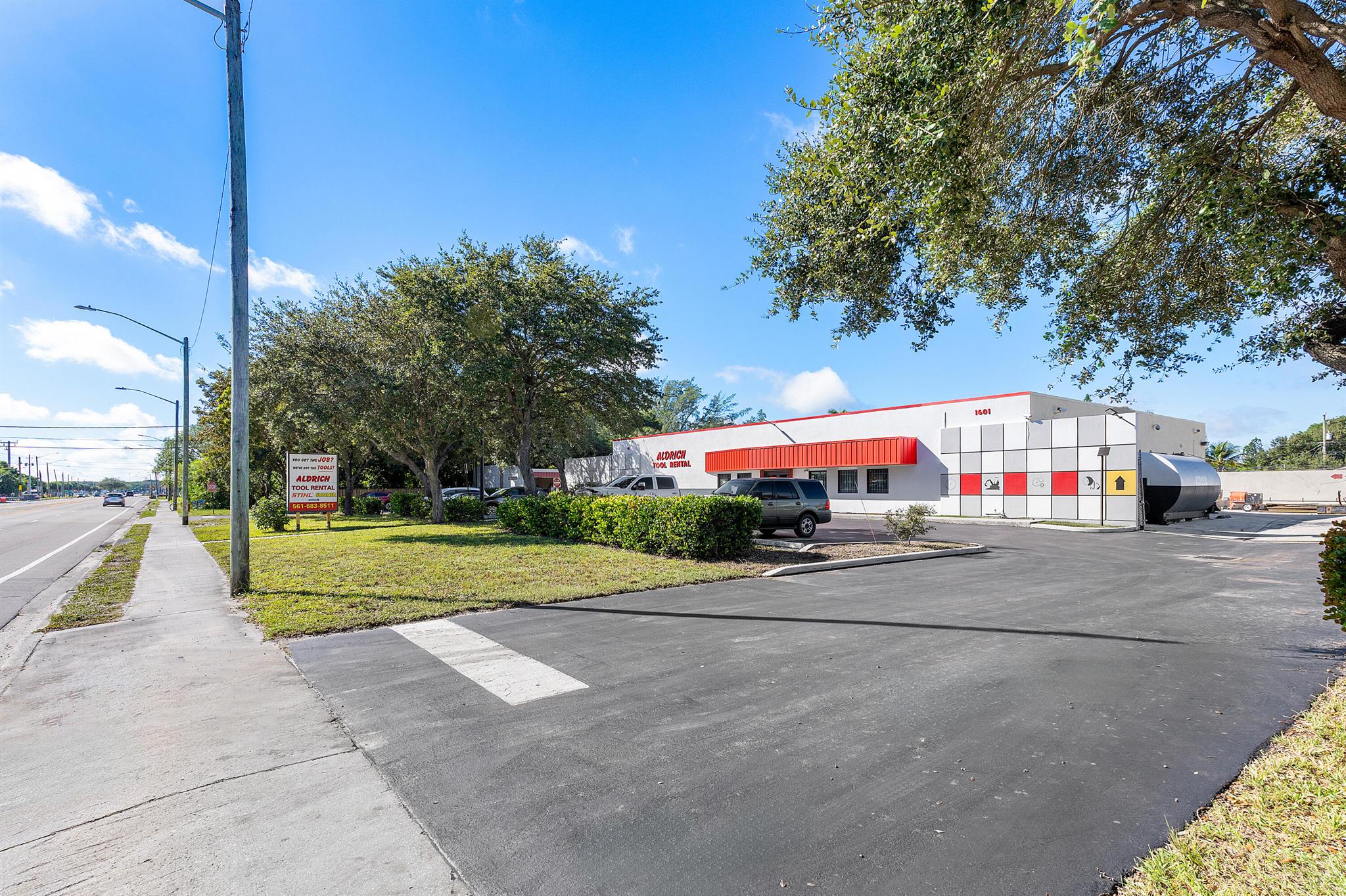We are pleased to present an exclusive real estate opportunity for sale. This is an approximately 11,364 square foot (sf) improved CBS free standing commercial/industrial building(s) situated on a 1.84 acre lot.
The main building features 7,458sf (estimated 2,000sf office/retail/showroom and 5500 warehouse) plus an attached 1,629sf of permanent covered storage space. The warehouse portion boasts 16' /- ceilings, 3 phase power and 3 roll up doors. The accessory building consists of a 550sf warehouse/office plus 1,750sf covered storage. The perimeter and storage yard are fully fenced with concrete walls.
There is monument signage and 400' /- of frontage on Congress Ave which generates significant exposure. The subject is situated conveniently in the heart o of West Palm Beach/Palm Beach County, close to both I95 and the Florida Turnpike, just south of major thoroughfare Okeechobee Rd and just north of the Palm Beach International Airport. The property is best configured for single tenant use but multi-tenant opportunities may exist.
It's zoned CG and UG through Palm Beach County and Westgate Overlay District, respectively. Value add real estate opportunities may include increasing building square footage, property redevelopment.