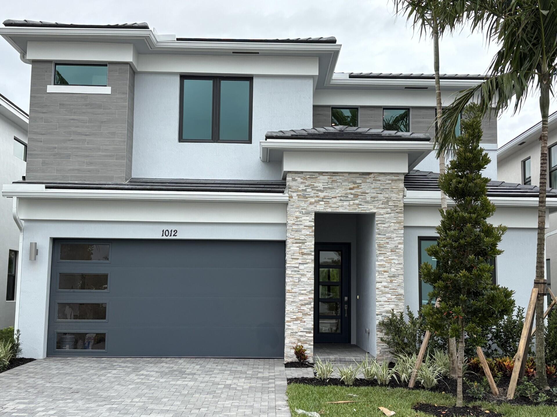 This new two-story home is ready for modern lifestyles. A bedroom and full bathroom are located near the front of the home off the foyer, leading to an open-concept layout shared between the kitchen, living and dining areas. A nearby lanai provides seamless indoor-outdoor living. On the second floor, a versatile loft provides a convenient shared living space easily accessible from three additional bedrooms and a lavish owner's suite with a full bathroom and walk-in closet.