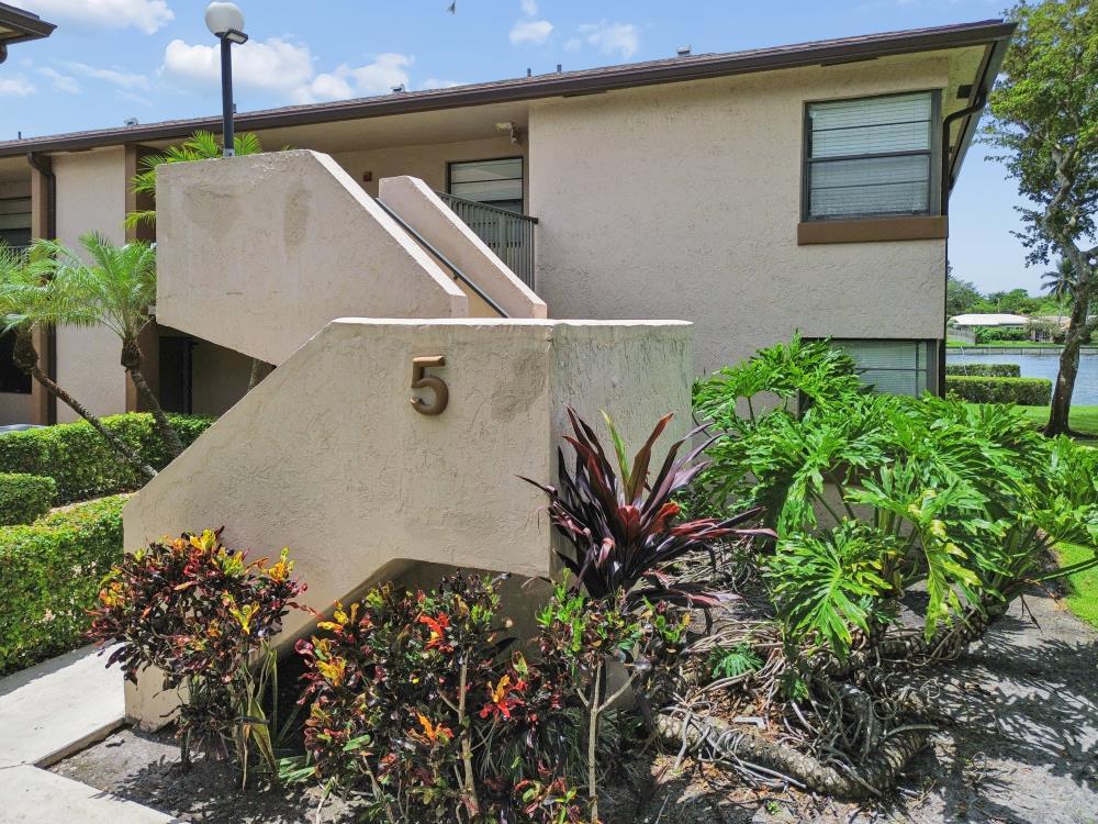 Beautiful 2BR/2BA canal-front condo in the heart of Tamarac! Fully remodeled and move-in ready. Features a bright, open floor plan, sleek modern updates, and a convenient in-unit washer & dryer. Enjoy peaceful waterfront views from your private screened balcony. Excellent location close to shopping, dining, and major highways. Perfect for buyers seeking a turnkey, low-maintenance lifestyle!