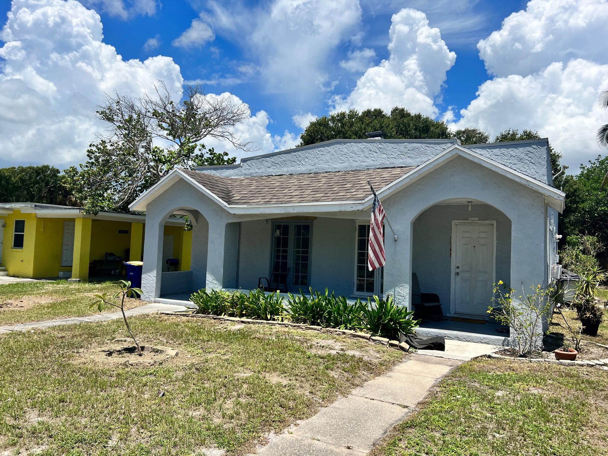 Now offered with exceptional seller financing at a below-market 5.5% interest rate with just 15% down! Whether you're looking to grow your investment portfolio or purchase your first income-producing property, this is an outstanding opportunity. This well-maintained 1920s duplex in Fort Pierce has been consistently occupied by the same reliable, on-time paying tenants since 2022, providing immediate rental income. Each unit has its own electric meter, with one shared water meter, plus a shared washer and dryer located behind the building. Recent improvements include a new roof (2020), most windows replaced (2021), renovated interiors in both units, including one with a newer kitchen and A/C units and the other featuring a brand-new bathroom. The most recent 4-point inspection reported no  deficiences. A charming covered front porch adds to the property's historic character and curb appeal. Don't miss this turnkey investment opportunity!