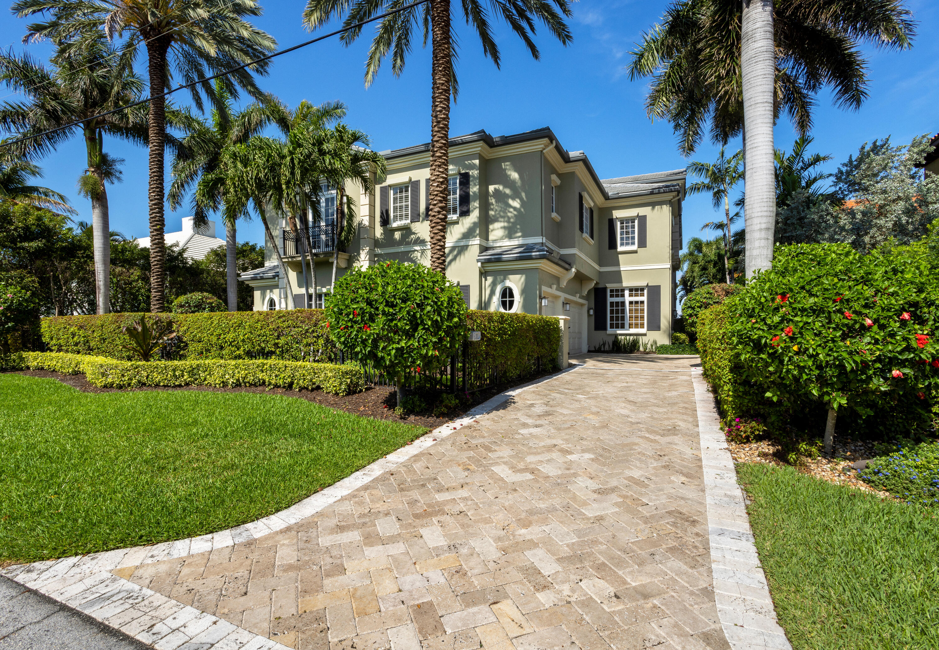 On the Intracoastal with a dock, near the beach and Downtown Delray Beach in sought-after Seagate, this custom residence, offers the epitome of waterfront living. Custom designed, features include high decorator ceilings, beautiful custom moldings, cherry-wood and marble flooring, and a wine room. The loggia and summer kitchen overlook the waterfront pool, inviting indoor/outdoor entertaining. LOCATION

300 Venetian Drive, Delray Beach, Florida: The sought-after Seagate area in East Delray Beach is just moments away from the prestigious Seagate Beach Club as well as the City's pristine award-winning beaches. This established neighborhood is also just a short walk to Downtown Delray Beach's vibrant Atlantic Avenue, with its array of arts and entertainment offerings interspersed with fine-dining establishments, cafés and bars.

PROPERTY:
 
Providing an impressive sense of arrival, tropically landscaped with majestic palms and verdant privacy hedges, the brick-paved driveway passes through gates to the three-car garage and front courtyard. In the backyard, the loggia and summer kitchen with a grill overlook the sun-splashed pool and spillover spa. A sought-after amenity for watersport enthusiasts and those desiring a waterfront lifestyle, this estate fronts 50 feet on the intracoastal Waterway, with a dock and boat lift. 

RESIDENCE:  

A classic masterpiece by  Stuart Brenner of the award-winning firm, Brenner Architecture,  with custom-home builder Robelen & Associates, this Bermuda-style residence, with four bedrooms and 5,728 +/- total square feet, offers Intracoastal waterfront living just two blocks from the beach in one of Delray Beach's most sought-after neighborhoods. Distinctive designer-curated details include gleaming marble and rich cherry-wood flooring, high ceilings embellished with custom moldings, beautifully crafted millwork and impact-glass windows and doors throughout. Offering a magnificent introduction, the foyer adjoins the stair hall, with a beautiful curving staircase and the arched entry to the brick-lined wine cellar. In the gracious living room, crowned by a high coffered ceiling and featuring a full-service wet-bar, French doors, topped by an arched transom, opens to the loggia, overlooking the pool and the Intracoastal. From the living room, a wide archway leads to the formal dining room, ornamented by chair rail, picture moldings, and a triple tray ceiling. Another wide archway leads to the  gourmet kitchen, topped by a beamed ceiling and fitted with custom cabinetry, granite counters, stone-tile backsplashes, an island accommodating seating, professional grade appliances, butler's pantry, and a spacious breakfast area with a buffet and two window-walls of glass doors accessing both the loggia and summer kitchen. Also on the first floor are the beautifully paneled library and a powder room. The second-floor landing, with a morning bar, overlooks the foyer, and offering a split-bedroom plan for privacy, the primary suite is placed separately from the three guest-bedroom suites. With a double-door entry, the suite comprises a luxurious bedroom that opens to a private Intracoastal-view balcony, a sitting room with a garden-view balcony, two spa-inspired onyx-finished bathrooms connected via a walk-through shower, and three custom-fitted closets. A laundry room completes the second-floor layout

The information herein is deemed reliable and subject to errors, omissions or changes without notice.  The information has been derived from architectural plans or county records. Buyer should verify all measurements. 

DISCLAIMER: Information published or otherwise provided by the listing company and its representatives including but not limited to prices, measurements, square footages, lot sizes, calculations, statistics, and videos are deemed reliable but are not guaranteed and are subject to errors, omissions or changes without notice. All such information should be independently verified by any prospective purchaser or seller. Parties should perform their own due diligence to verify such information prior to a sale or listing. Listing company expressly disclaims any warranty or representation regarding such information. Prices published are either list price, sold price, and/or last asking price. The listing company participates in the Multiple Listing Service and IDX. The properties published as listed and sold are not necessarily exclusive to listing company and may be listed or have sold with other members of the Multiple Listing Service. Transactions where listing company represented both buyers and sellers are calculated as two sales. The listing company's marketplace is all of the following: Vero Beach, Town of Orchid, Indian River Shores, Town of Palm Beach, West Palm Beach, Manalapan Beach, Point Manalapan, Hypoluxo Island, Ocean Ridge, Gulf Stream, Delray Beach, Highland Beach, Boca Raton, East Deerfield Beach, Hillsboro Beach, Hillsboro Shores, East Pompano Beach, Lighthouse Point, Sea Ranch Lakes and Fort Lauderdale. Cooperating brokers are advised that in the event of a Buyer default, no financial fee will be paid to a cooperating Broker on the Deposits retained by the Seller. No financial fees will be paid to any cooperating broker until title passes or upon actual commencement of a lease. Some affiliations may not be applicable to certain geographic areas. If your property is currently listed with another broker, please disregard any solicitation for services. Copyright 2022 by the listing company. All Rights Reserved.