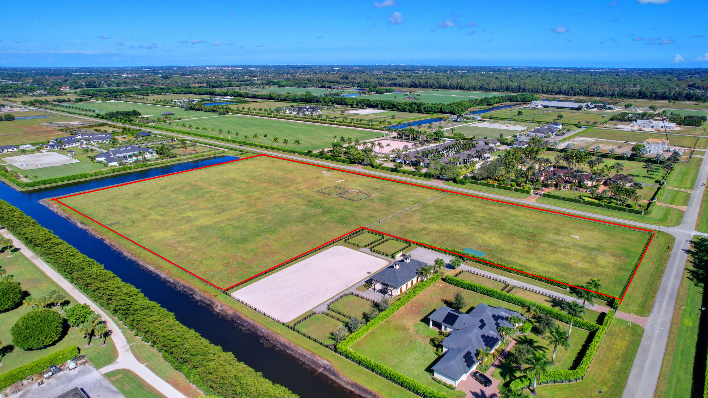 An opportunity to build your dream equestrian estate in the prestigious gated community of Wellington Preserve. One of the last remaining parcels with exceptional flexibility and potential, this offering combines 10.2343 acres and 3.1296 acres for a spectacular 13+ acre estate parcel  or the property may be re-platted into two separate lots of approximately 6+ and 7+ acres.  High and dry with paved road access, city water, and sewer already available, the land is cleared and ready for development. Ideally located in one of Wellington's premier private equestrian communities.  This property offers the perfect setting to create a custom equestrian compound, luxury residence, barns, arenas, and riding facilities just minutes from world-class equestrian venues, dining, and shopping. A truly exceptional opportunity with endless possibilities in the heart of Wellington's equestrian lifestyle.