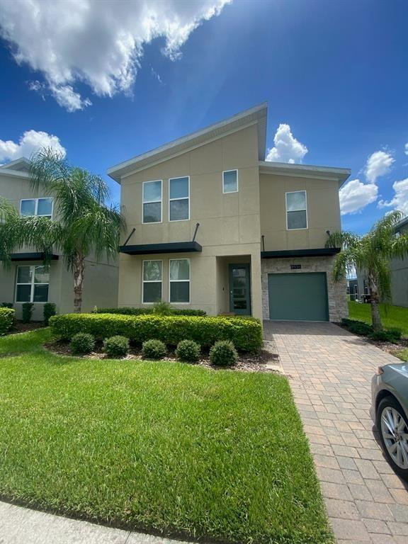 Welcome to luxury resort-style living in the highly sought-after gated community of ChampionsGate! This beautifully appointed 6-bedroom, 5-bath residence offers the perfect blend of comfort, space, and location, making it ideal as a primary residence, second home, or investment opportunity.  Designed for entertaining and relaxation, this spacious home features an open-concept floor plan, a modern chef's kitchen, expansive living areas, and stylish furnishings throughout. Step outside to your private screened lanai where you'll enjoy a heated pool, spa, and peaceful lake views, the perfect place to unwind after a day enjoying Central Florida's world-famous attractions.   As a homeowner, you'll have access to the incredible Oasis Club Resort amenities, including a spectacular water park with lazy river, resort-style pools, fitness center, movie theater, tennis courts, basketball, volleyball, golf, playgrounds, and more.  Conveniently located just minutes from Walt Disney World, Universal Orlando, ChampionsGate Golf Club, Posner Park shopping, restaurants, major highways, Orlando International Airport, and Central Florida's top attractions.  Whether you're searching for a luxury Florida home, a vacation retreat, or an income-producing investment property, this exceptional ChampionsGate residence offers an outstanding opportunity in one of Central Florida's most desirable resort communities.