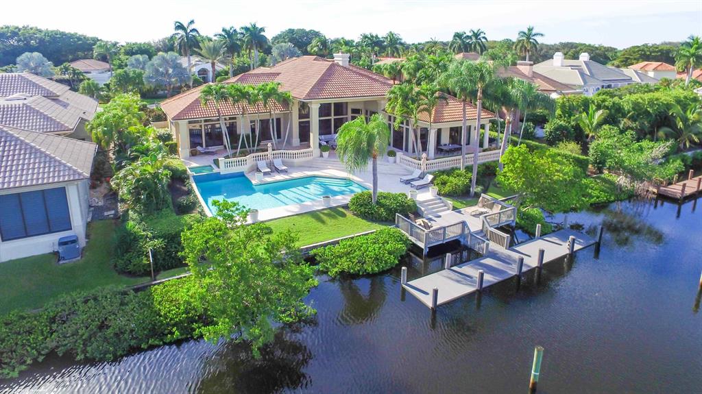 Custom estate on deep water w/ocean access in prestigious Frenchman's Creek, w/its one & only Beach Club & unsurpassed golf & amenities. Impeccable design & high quality finishes offering loads of natural light & views from every room.Classically remodeled kitchen w/top of the line appliances, fixtures & finishes. Spacious 1st floor Master Suite w/huge custom outfitted closets, spa-like master bath w/custom marble flooring, gorgeous fixtures & venetian plaster walls.Six generous guest suites including one as large as a master, all w/ensuite bathrooms that have been beautifully updated.Resort style outdoor living area w/stunning views, spectacular pool, lush landscaping & two separate covered areas w/Pecky Cypress ceilings. Dock re-built in 2010.Impact Glass on 2nd Floor. Electric Shutters.
