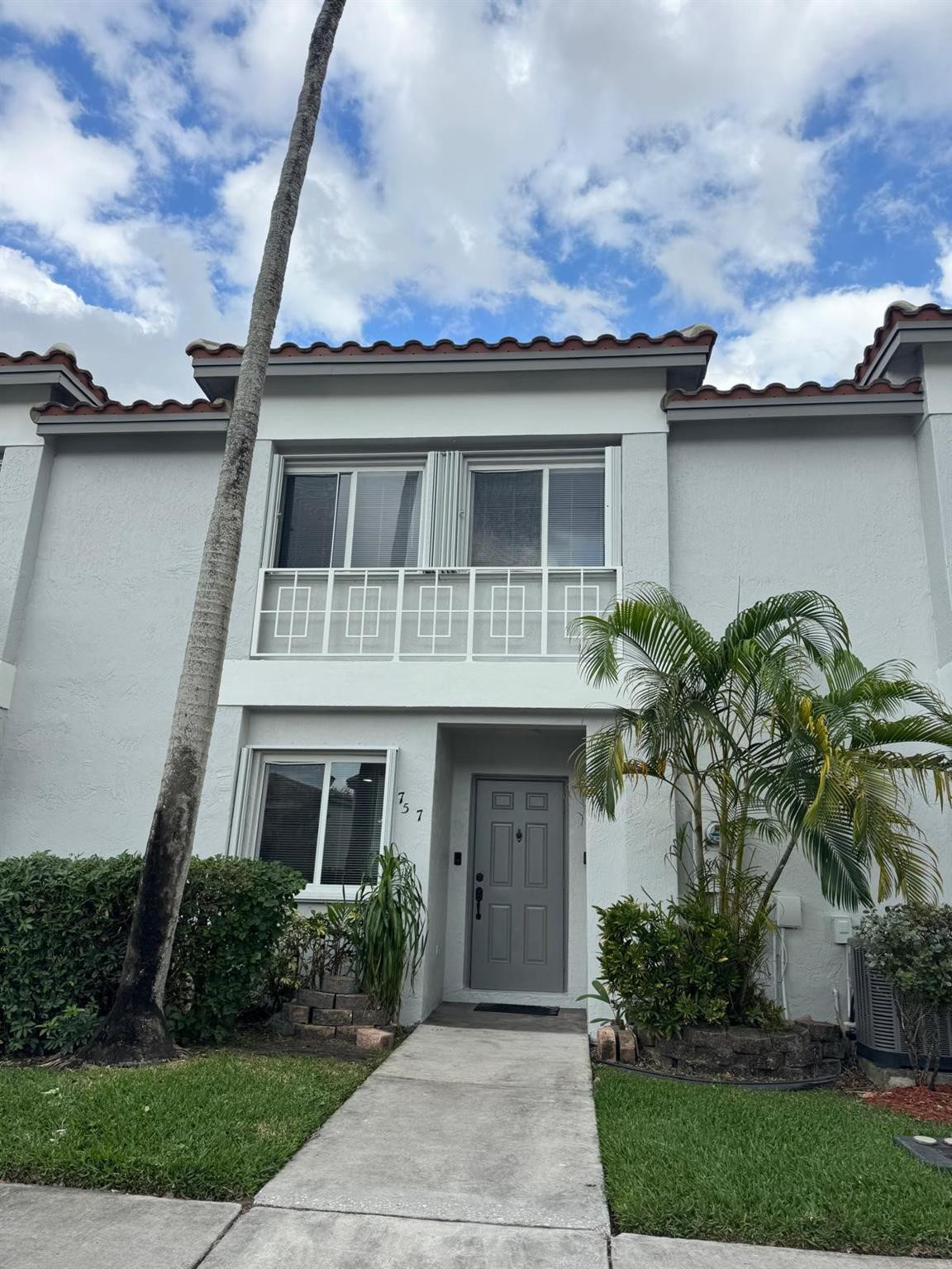 Beautifully updated 3-bedroom, 2-bathroom "Baja" model townhouse located in the highly desirable gated community of Malibu Bay at Chapel Trail. This townhome features a brand-new roof (2025) a remodeled kitchen with granite countertops and 2023 Whirlpool stainless steel range & microwave. The open layout includes updated flooring throughout, recessed lighting, and a full-size Maytag 2023 washer & dryer. Unique pull-down attic ladder offers additional storage access. Enjoy the enclosed patio with peaceful garden views, perfect for relaxation. Accordion shutters offer storm protection. Community amenities include a clubhouse, pool, gym, and tennis courts. As a resident, you also have access to Rose Price Park with plenty amenities. A+ School District.  HOA Monthly fee is $ 184 (Malibu Bay).