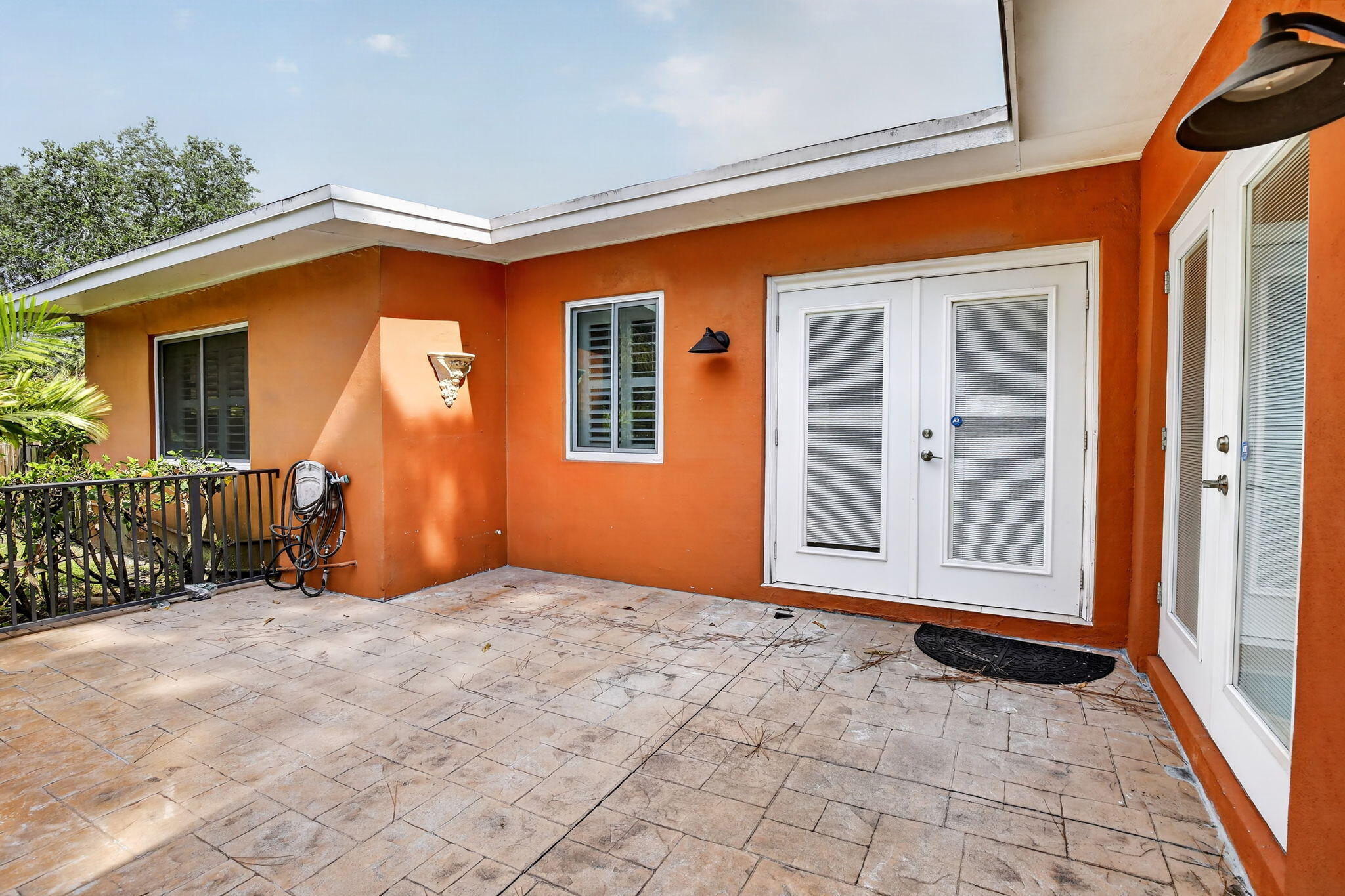 Welcome to 1101 E Country Club Circle, Plantation, FL 33317—a rare opportunity to own a spacious home in a highly desirable location with NO HOA restrictions or fees. Offering exceptional flexibility, modern conveniences, and resort-style outdoor living, this property is perfect for multigenerational living, entertaining, or generating additional income potential.  One of the standout features of this home is the private mother-in-law suite with its own separate entrance, providing an ideal setup for extended family, guests, a home office, or potential rental opportunities. The thoughtful layout offers both privacy and functionality while maintaining a seamless connection to the main residence. Step outside and discover your own private backyard oasis featuring a heated swimming pool, allowing you to enjoy Florida living year-round. Whether you're hosting family gatherings, entertaining friends, or simply relaxing poolside, this outdoor space is designed to make every day feel like a vacation.  Additional upgrades include a tankless water heater, providing energy efficiency and an endless supply of hot water and hurricane rated windows throughout. The home's spacious living areas, comfortable bedrooms, and versatile floor plan create the perfect balance of comfort and convenience.  Located in one of Plantation's most established and sought-after neighborhoods, residents enjoy easy access to shopping, dining, entertainment, and recreational opportunities. Nearby activities include golfing at local championship courses, walking and biking trails, community parks, and outdoor recreation areas. Enjoy shopping and dining at Plantation Walk, Broward Mall, and numerous nearby restaurants and entertainment venues.  Commuters will appreciate the home's convenient access to major highways including I-595, Florida's Turnpike, and I-95, providing easy travel throughout Broward, Miami-Dade, and Palm Beach Counties. The beautiful beaches of Fort Lauderdale, Las Olas Boulevard, downtown Fort Lauderdale, and major airports are all within a short drive.  Combining NO HOA, a private mother-in-law suite with separate entrance, a heated pool, tankless water heater, and an outstanding Plantation location, this home offers an exceptional opportunity to enjoy the best of South Florida living. Schedule your private showing today!