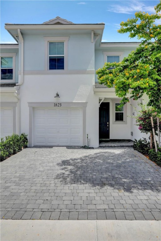 Welcome home to this beautiful 3 Bedroom/2.5 Bath Townhouse with a 1 car garage in a quiet gated community. This home was built in 2022 so everything is brand new! Enjoy your full insurance credits with the new roof and Impact Windows and Doors. Control your climate from your phone with the Ecobee smart thermostat. The owner has installed an Allini Water filtration system for entire house (see attachment/negotiable). Take a short walk to the pool and gym. Catch a good workout and a refreshing swim. Or, stay home and relax on your patio in your Jacuzzi hot tub with lounge seating. This community has a low HOA fee which includes Cable and Internet. Shops and Restaurants are nearby and the local beaches are about 10 minutes away. Neighborhood is Pet Friendly and you can rent right away.