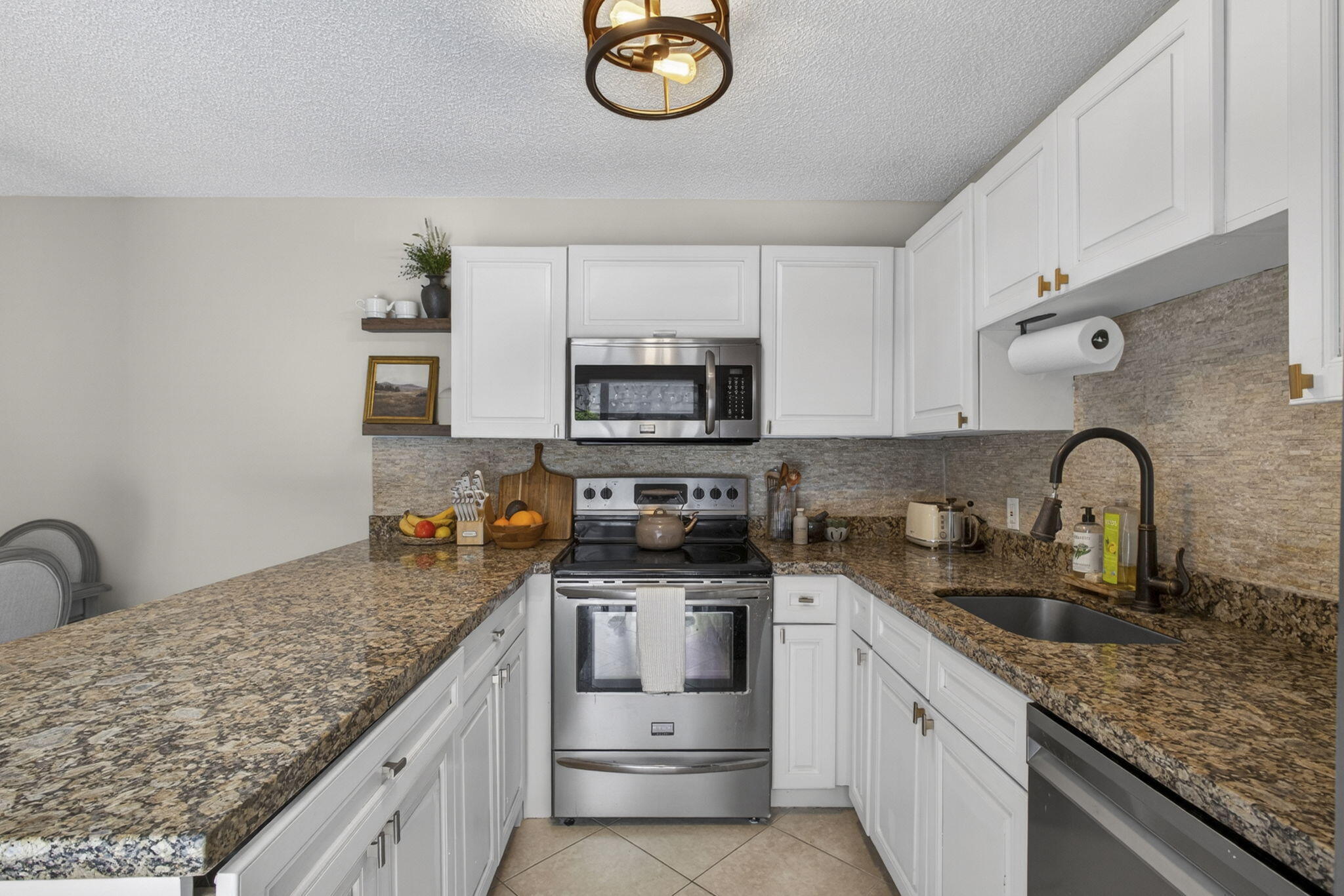 Welcome to this charming 3-bedroom, 2.5-bathroom townhouse in the Glenwood section, Palm Beach Gardens. Situated across two stories, this 1,488 square-foot residence offers comfortable living space thoughtfully designed for modern convenience. The well-appointed layout provides distinct areas for relaxation and entertaining, with multiple space ensuring comfort for all residents. Located in the heart of Palm Beach Gardens, this townhouse presents an excellent opportunity for those seeking a practical, well-proportioned home in an established community.