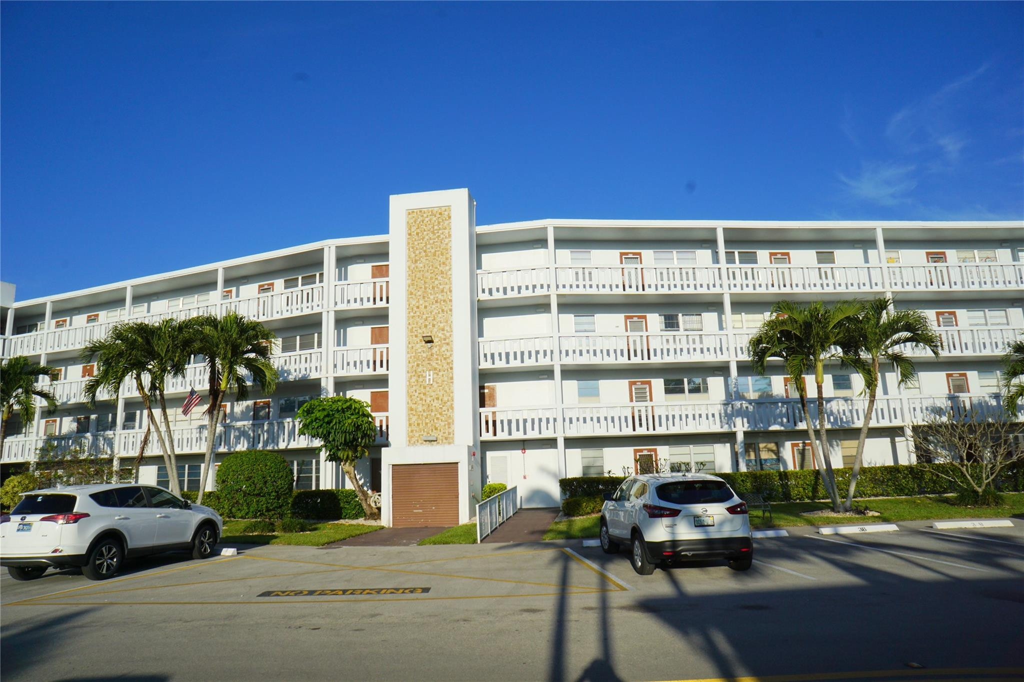 This Penthouse 1 bedrum, 1.5 bath w/ beautiful water view is waiting for YOU! Enjoy a cup of coffee as the sun rises from your screened back patio w/roll down storm shutters & an eastern exposure. Kitchen with stainless appliances, double sink, flat top stove & recessed lighting. AC & hot water heater are brand new! Unit is furnished w/ new living room furnishings and new sleeping sofa. Bedroom with all new bed set items and new covers. New patio furniture. Ceramic tile thru-out & high-end closet drs! This is a non-rental bldg. The Century Village amenities incl a lavish clubhouse w/a 1500 seat theater, movies, fitness center, pickleball, tennis, indoor & outdoor pools, classes of every type & more! Close to Deerfield Bch, shopping, restaurants, & major highways. Assoc. Claims 55+